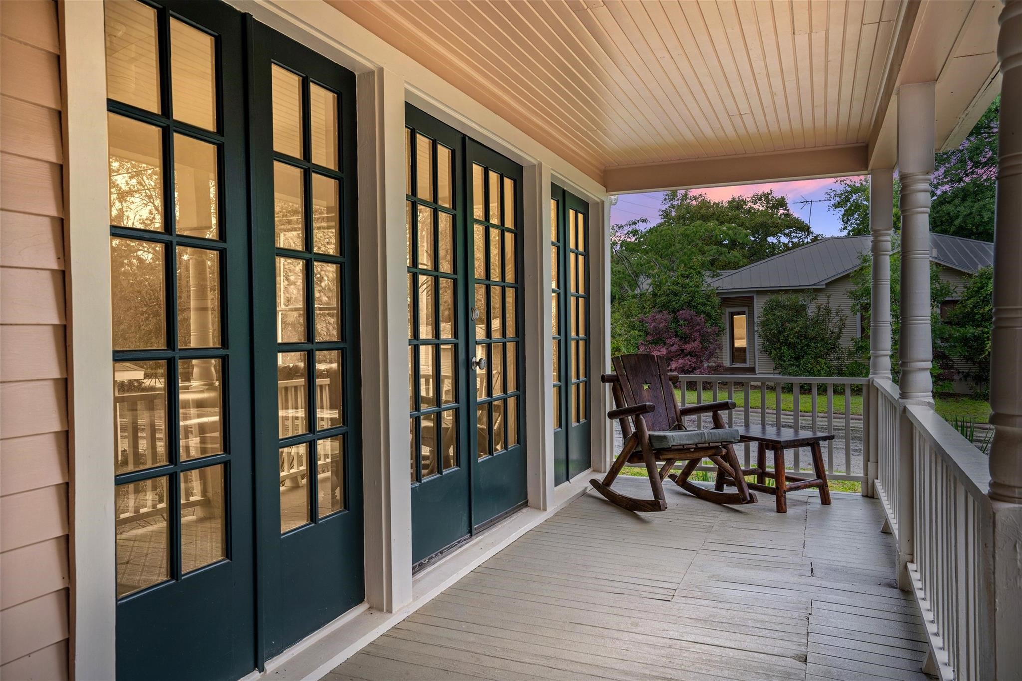 806 East Main Street Bellville, TX 77418 - Photo 6 of 38 a view of a balcony with chairs and wooden floor