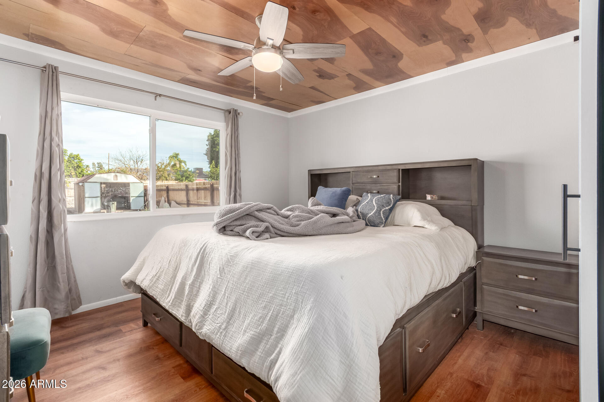 4826 West Wagoner Road Glendale, AZ 85308 - Photo 14 of 26 a bedroom with a bed and a tv