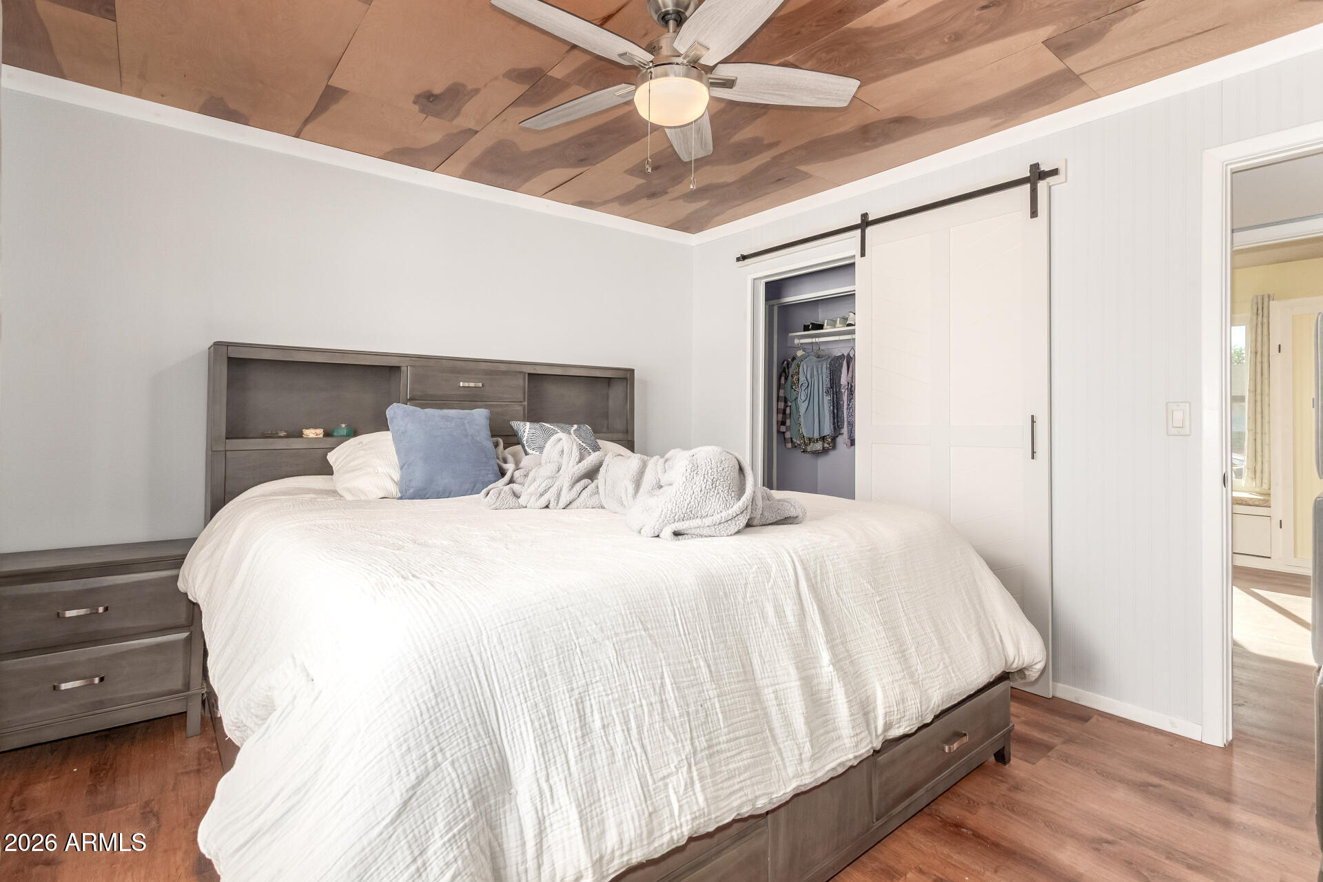 4826 West Wagoner Road Glendale, AZ 85308 - Photo 15 of 26 a bedroom with a bed and a window