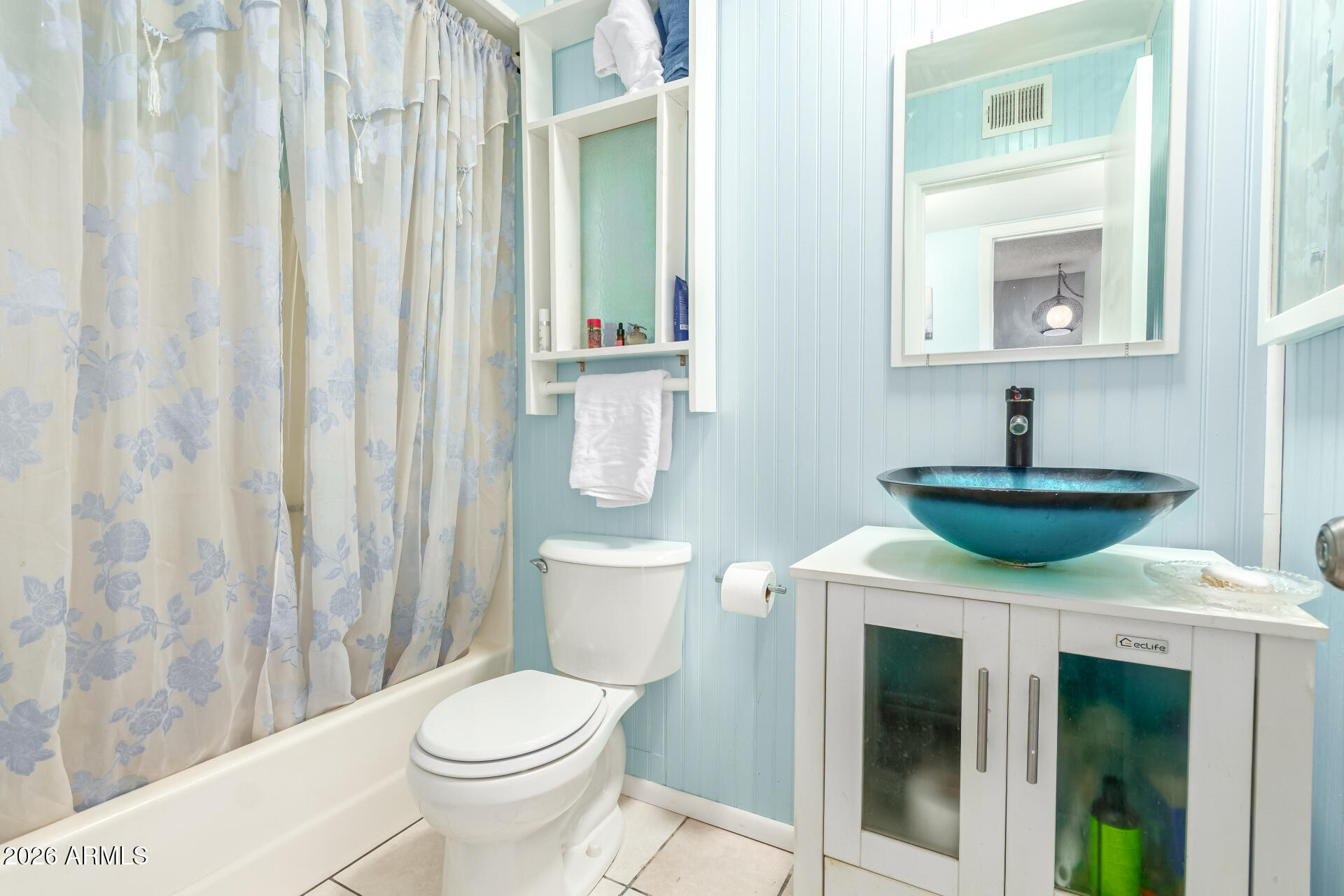 4826 West Wagoner Road Glendale, AZ 85308 - Photo 18 of 26 a bathroom with a toilet and a sink