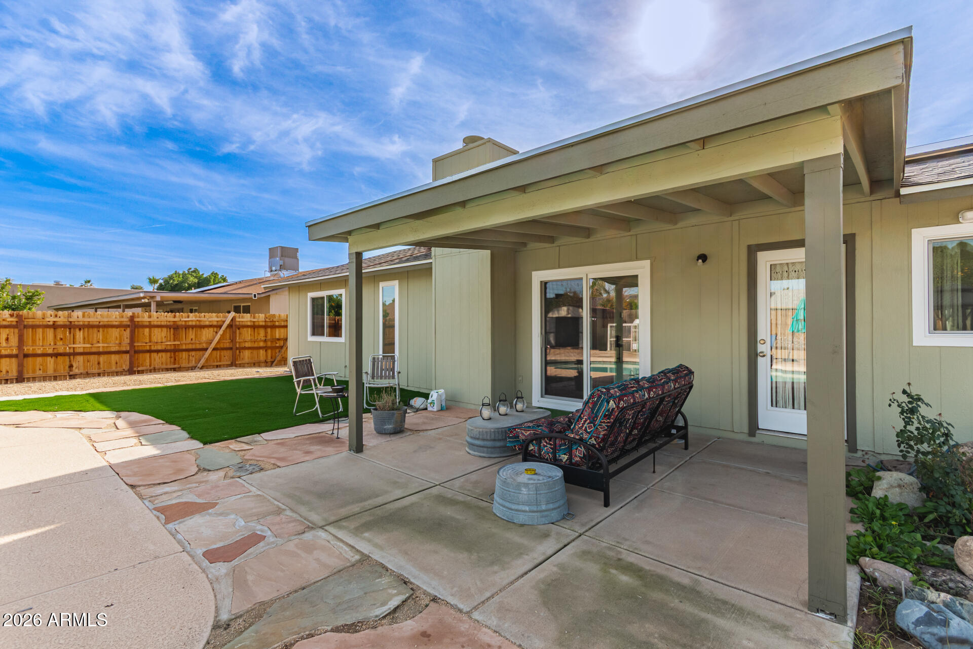 4826 West Wagoner Road Glendale, AZ 85308 - Photo 21 of 26 a view of a house with backyard and porch