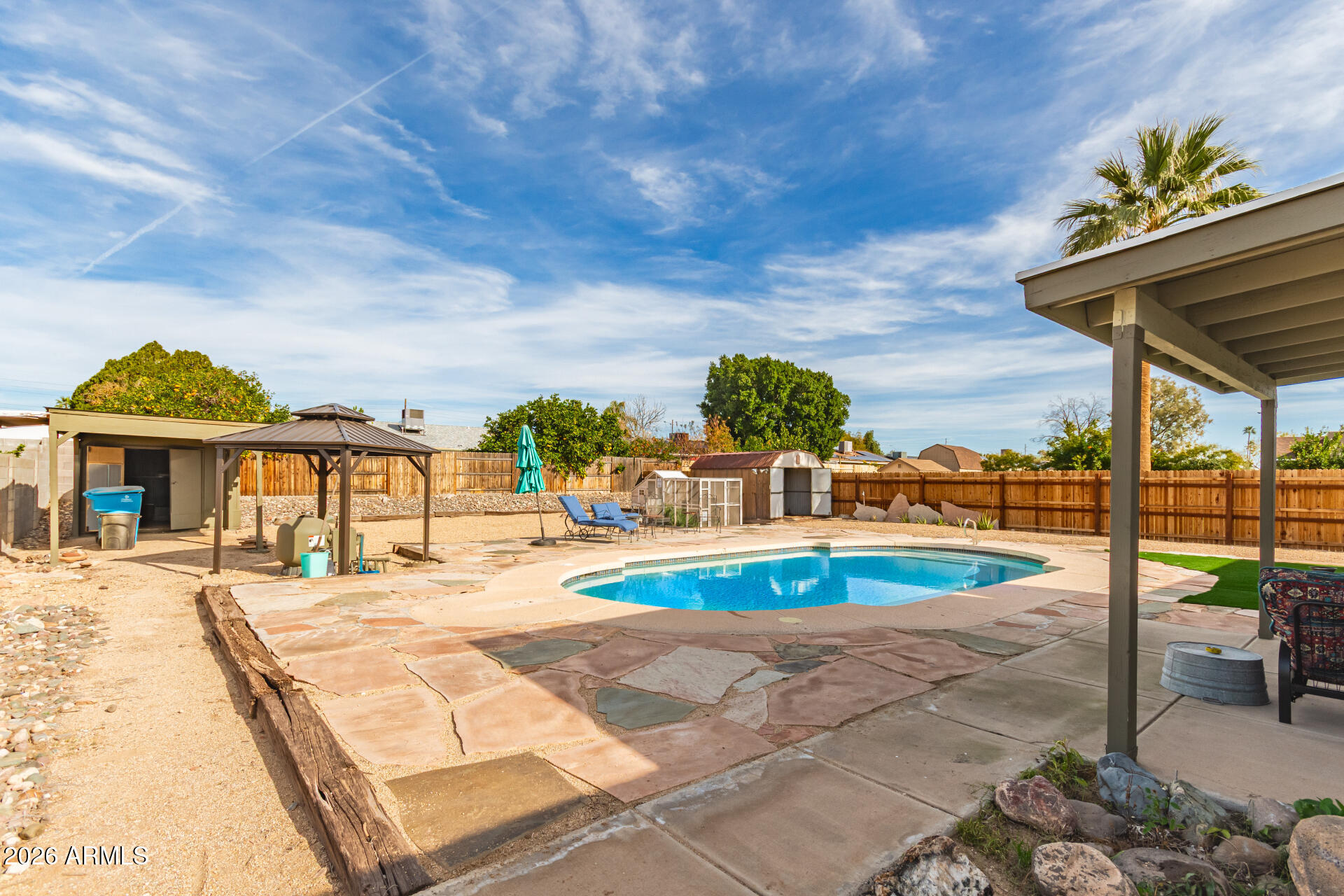 4826 West Wagoner Road Glendale, AZ 85308 - Photo 23 of 26 a view of a backyard with swimming pool