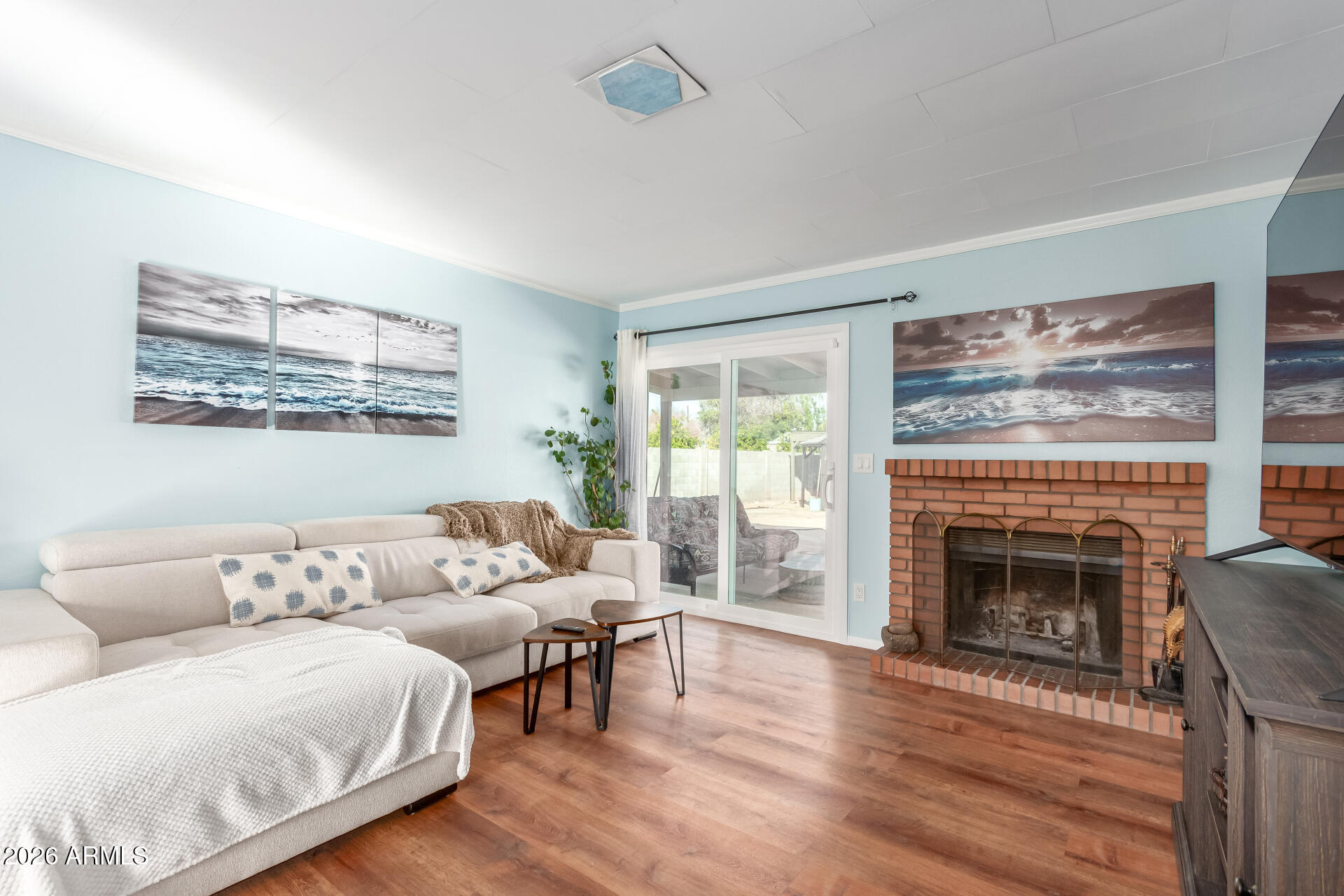 4826 West Wagoner Road Glendale, AZ 85308 - Photo 5 of 26 a living room with furniture and a fireplace