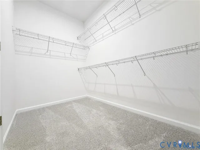 a view of a room with racks on the wall