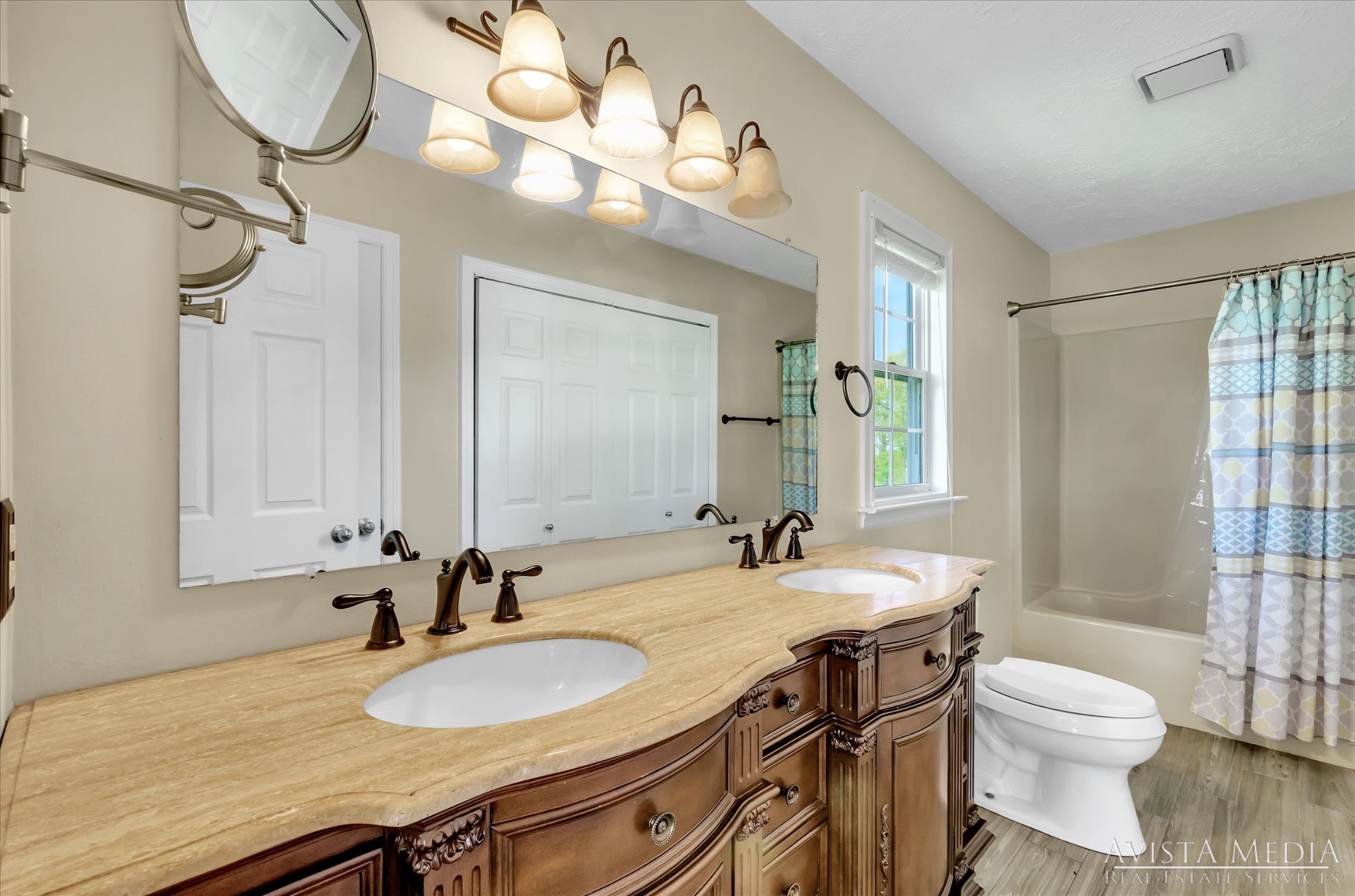 6348 Gum Station Road Springfield, TN 37172 - Photo 8 of 19 a bathroom with a granite countertop sink a toilet and a mirror