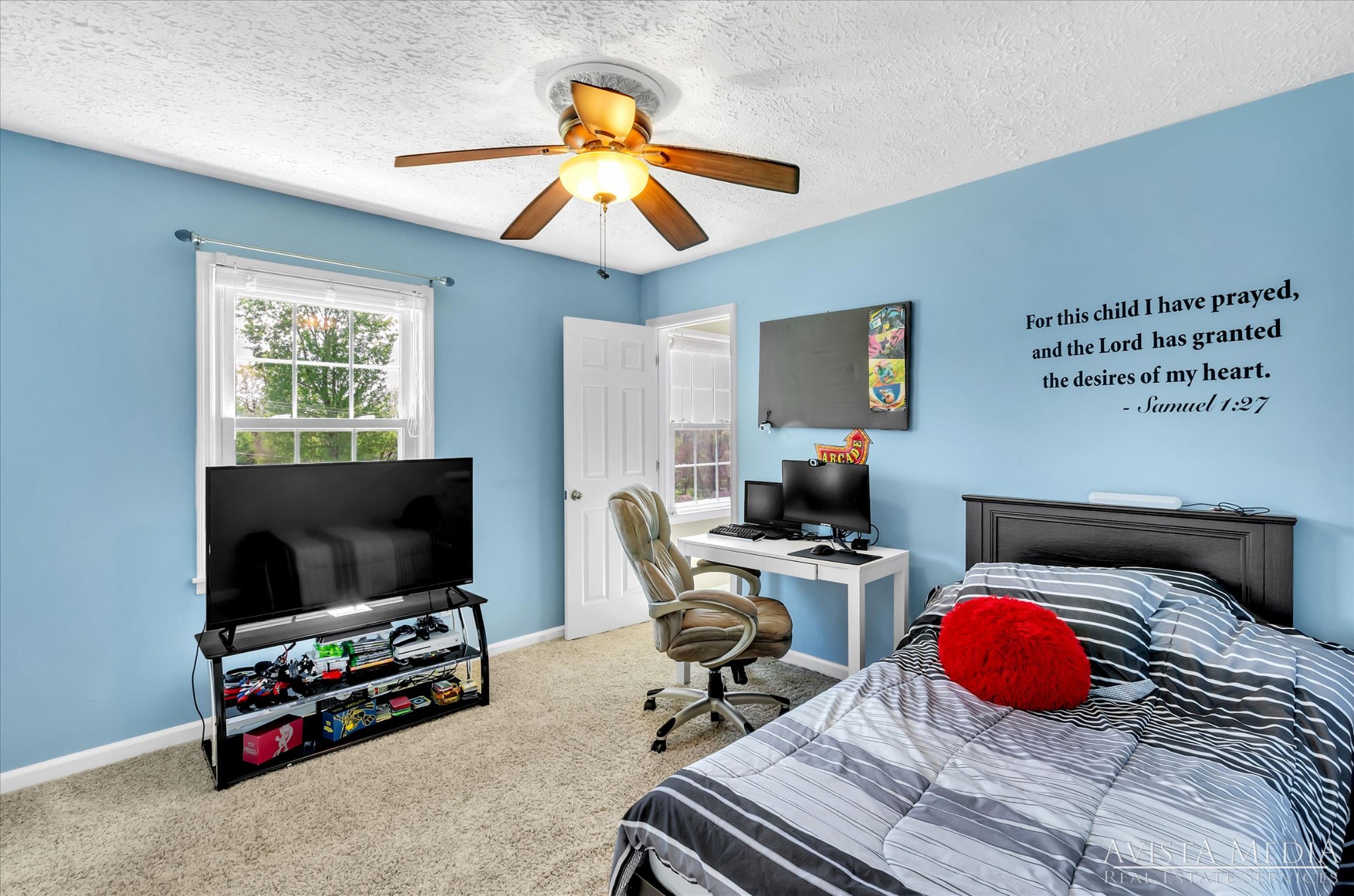 6348 Gum Station Road Springfield, TN 37172 - Photo 9 of 19 a bedroom with a bed and a flat screen tv