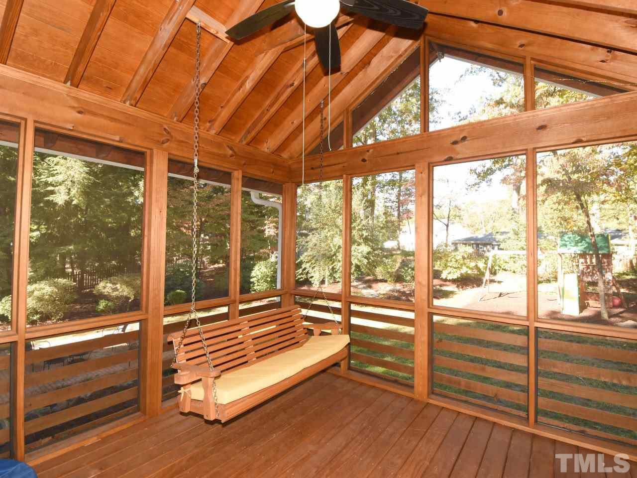 616 Macon Place Raleigh, NC 27609 - Photo 20 of 25 a view of a room with wooden floor and windows