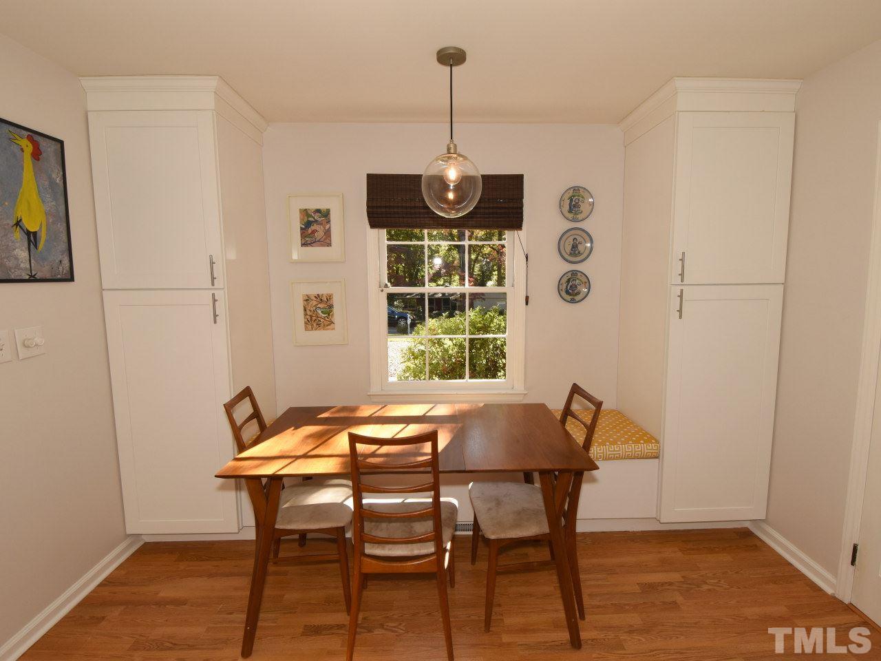 616 Macon Place Raleigh, NC 27609 - Photo 6 of 25 a dining room with furniture and window