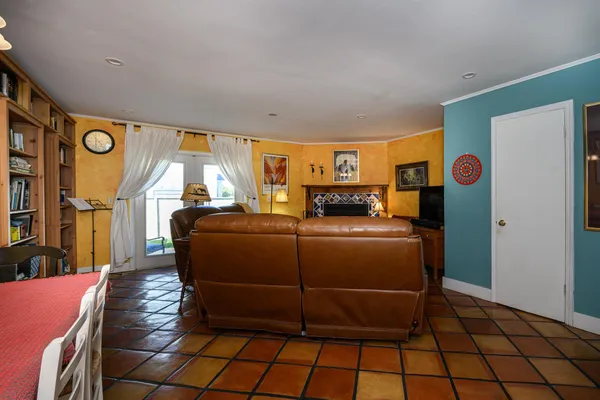 a dining room with a table and chairs