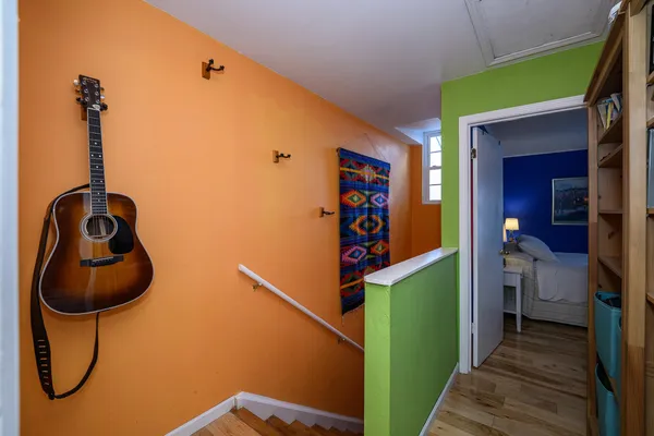 a view of an empty room with windows