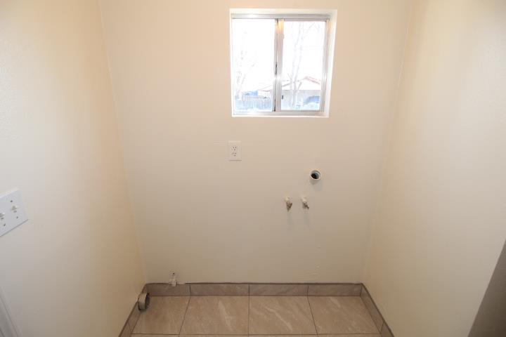 90 Magnolia Avenue Lemoore, CA 93245 - Photo 15 of 17 a view of room with window