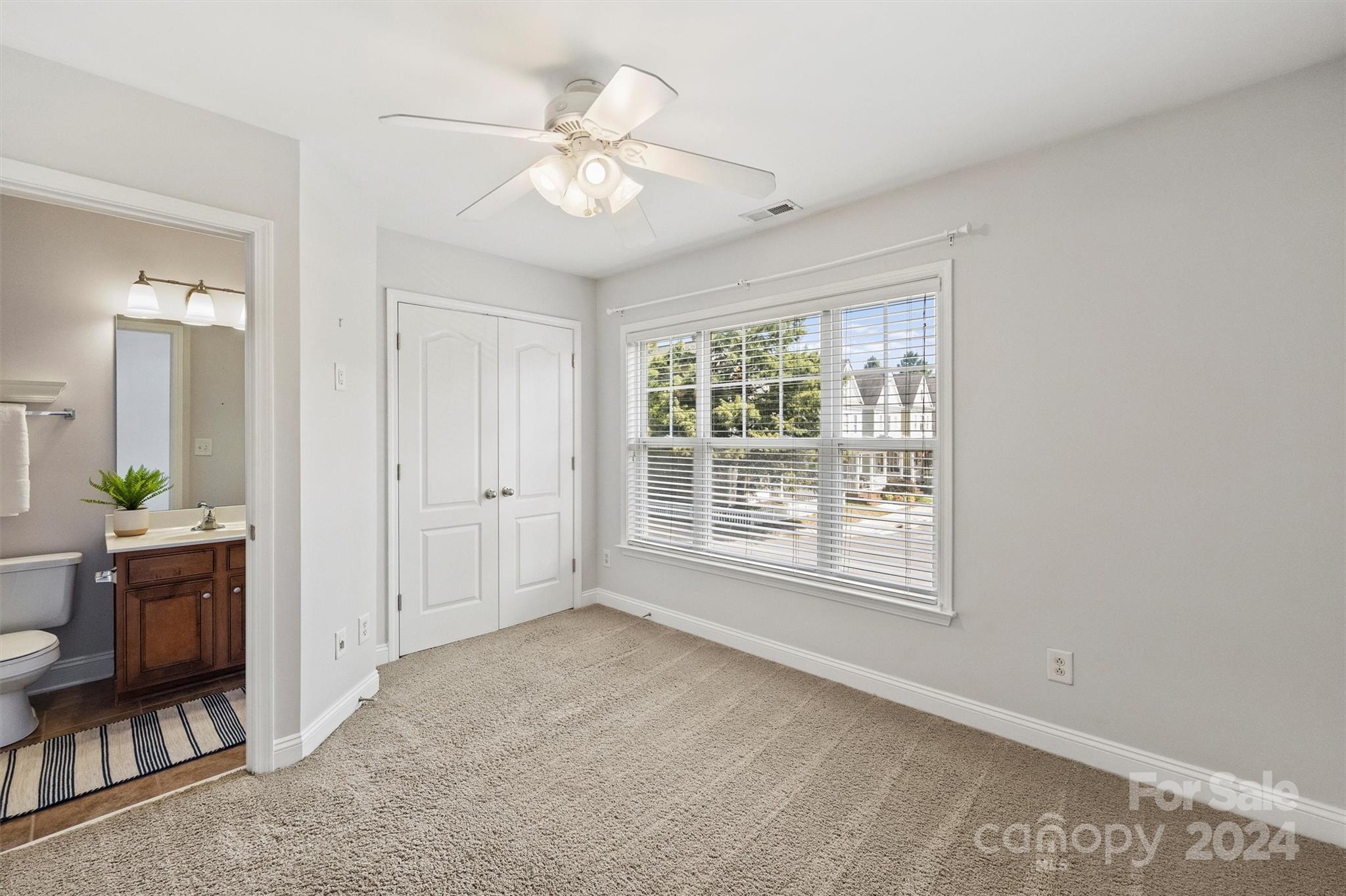 323 Hurston Circle Charlotte, NC 28208 - Photo 17 of 27 a view of an empty room with a window
