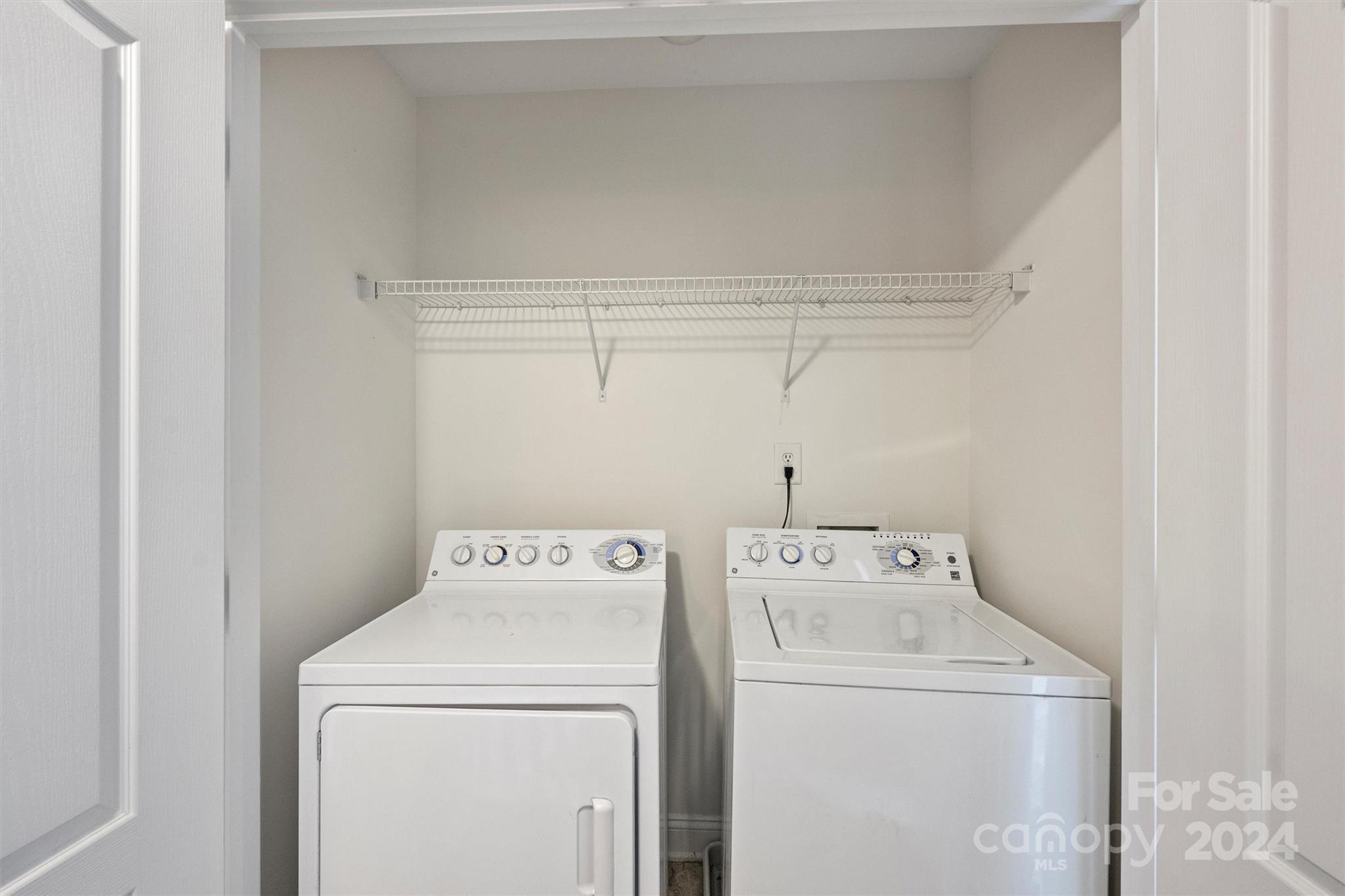323 Hurston Circle Charlotte, NC 28208 - Photo 20 of 27 a utility room with dryer and washer