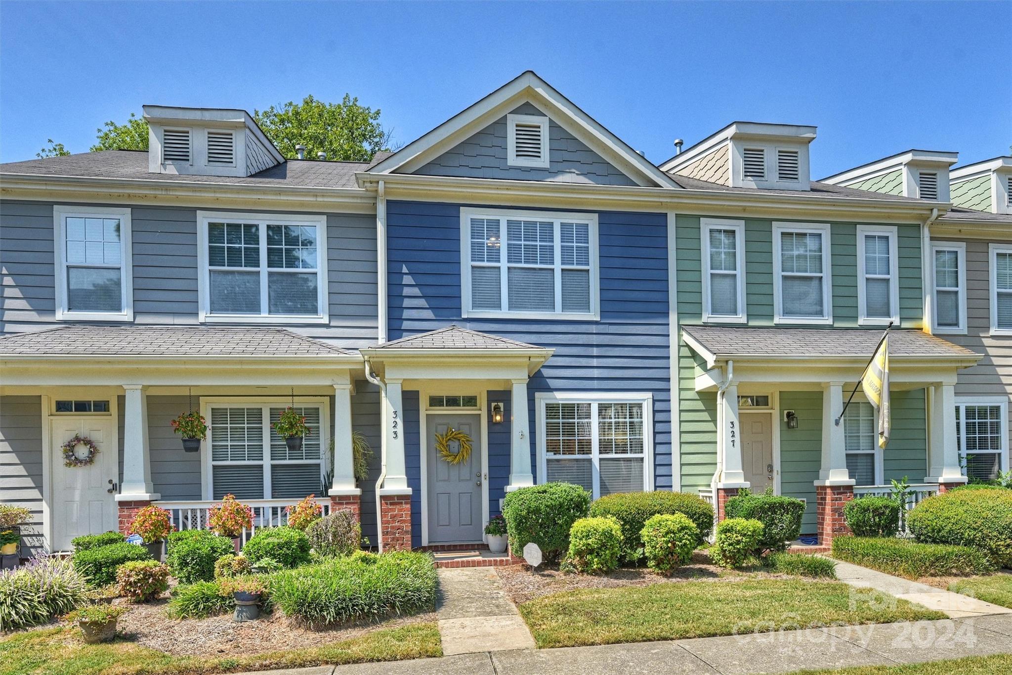 323 Hurston Circle Charlotte, NC 28208 - Photo 27 of 27 a front view of a house with garden and porch