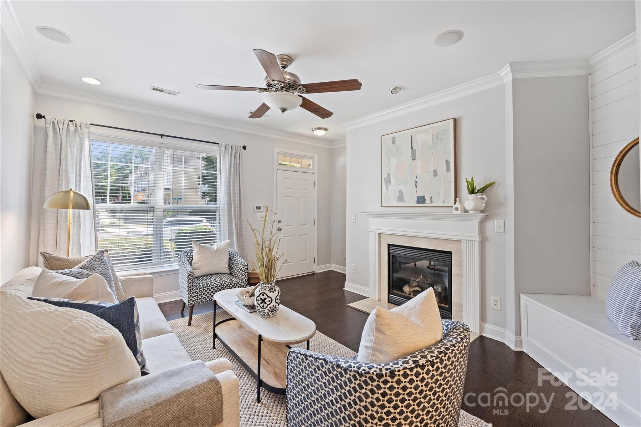 323 Hurston Circle Charlotte, NC 28208 - Photo 3 of 27 a living room with furniture and a fireplace