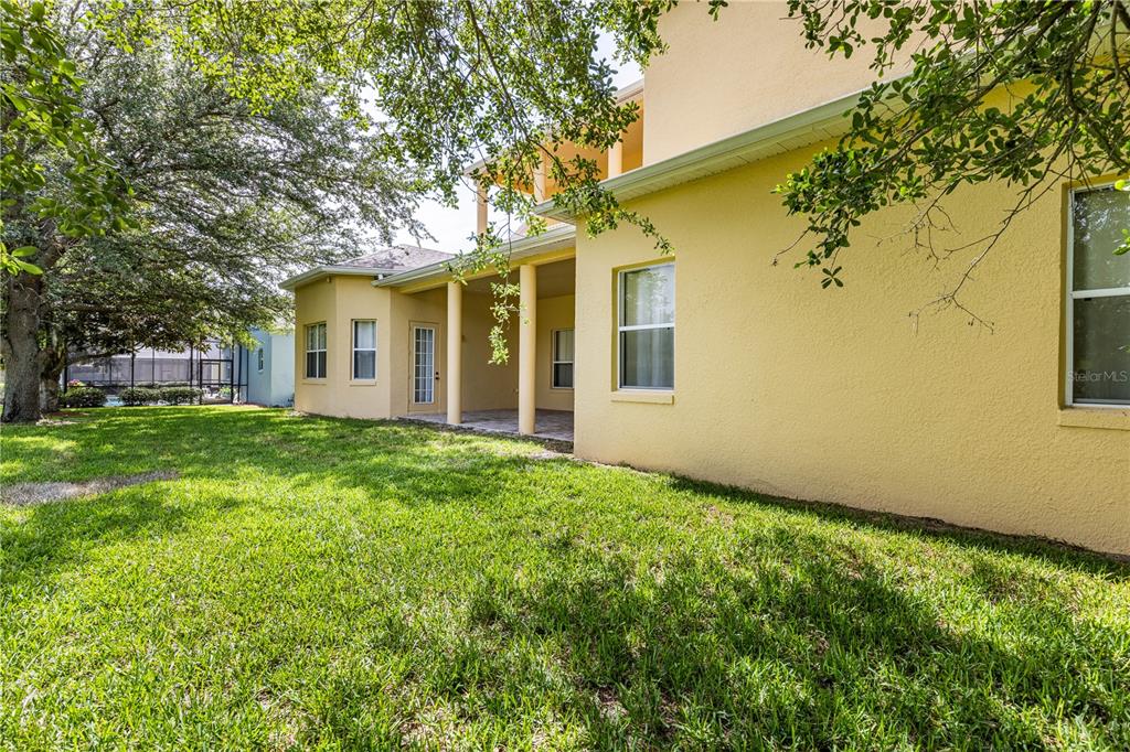 2718 Knightsbridge Road Clermont, FL 34711 - Photo 58 of 72 front view of a house with a yard