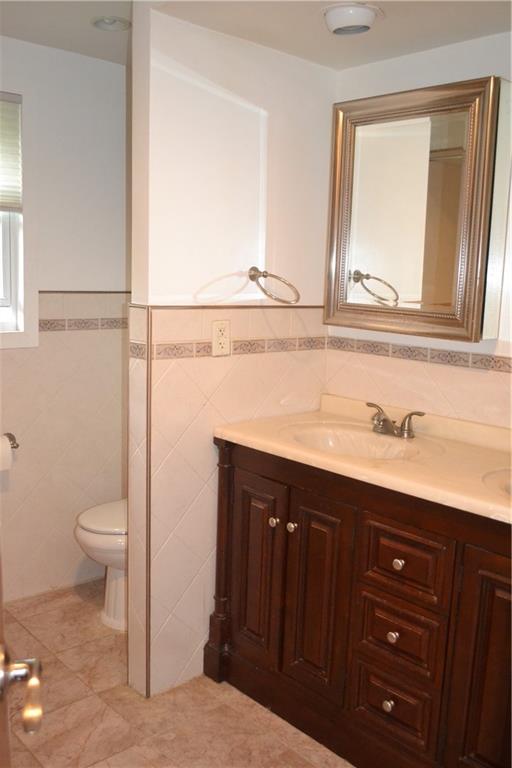 138 Mowl Road Washington, PA 15301 - Photo 24 of 43 a bathroom with a sink a toilet and vanity