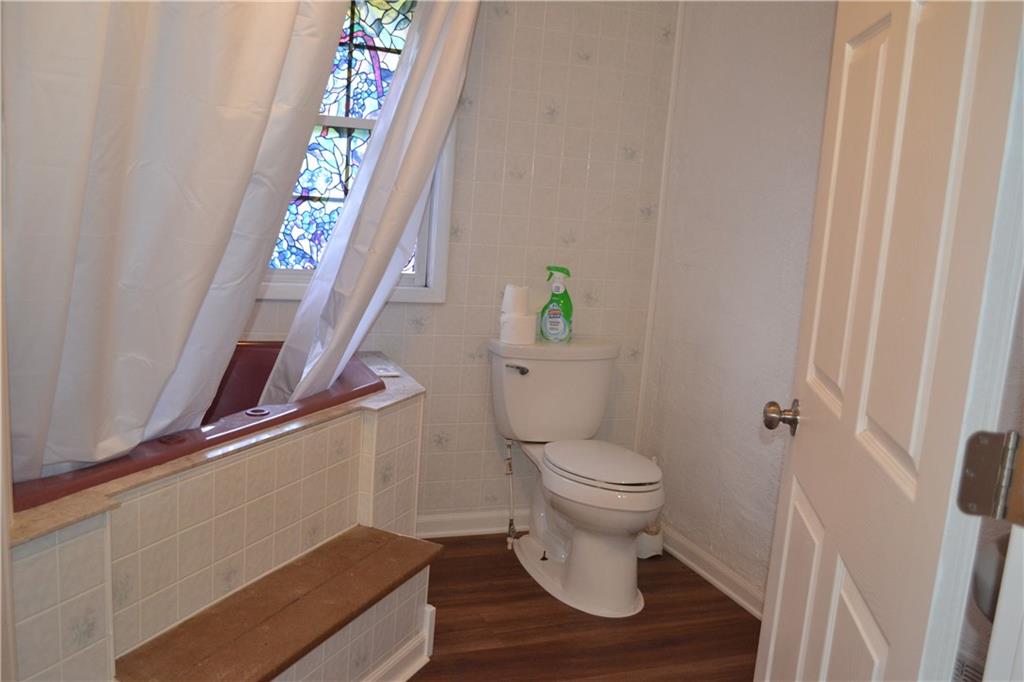 138 Mowl Road Washington, PA 15301 - Photo 28 of 43 a white toilet sitting next to a window