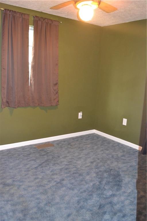 138 Mowl Road Washington, PA 15301 - Photo 38 of 43 a view of an empty room with a window