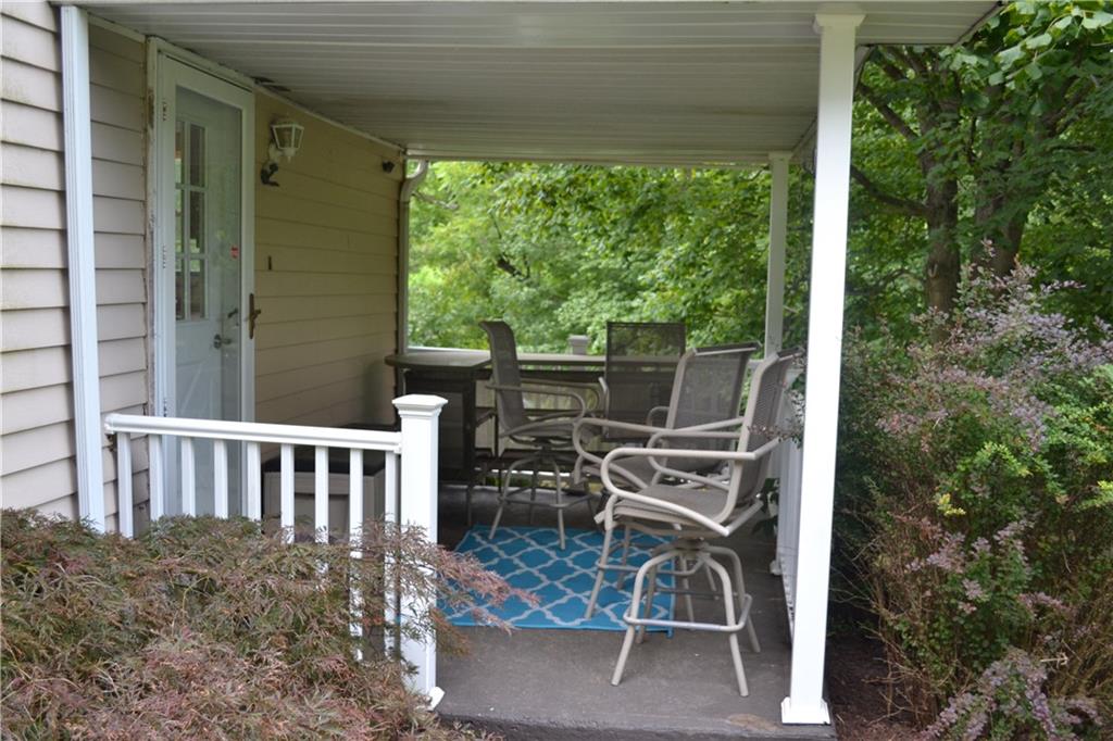 138 Mowl Road Washington, PA 15301 - Photo 42 of 43 a view of a chairs and table in the balcony