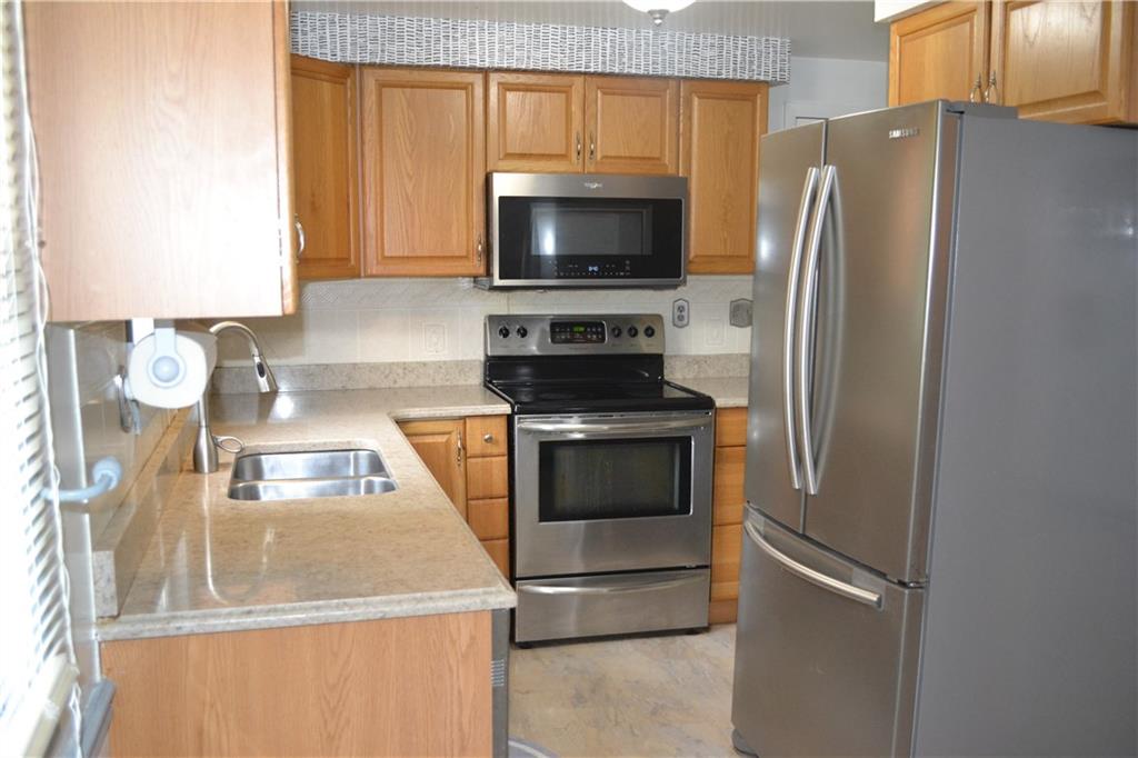 138 Mowl Road Washington, PA 15301 - Photo 5 of 43 a kitchen with a refrigerator sink and microwave