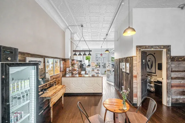 a view of a kitchen and dining room