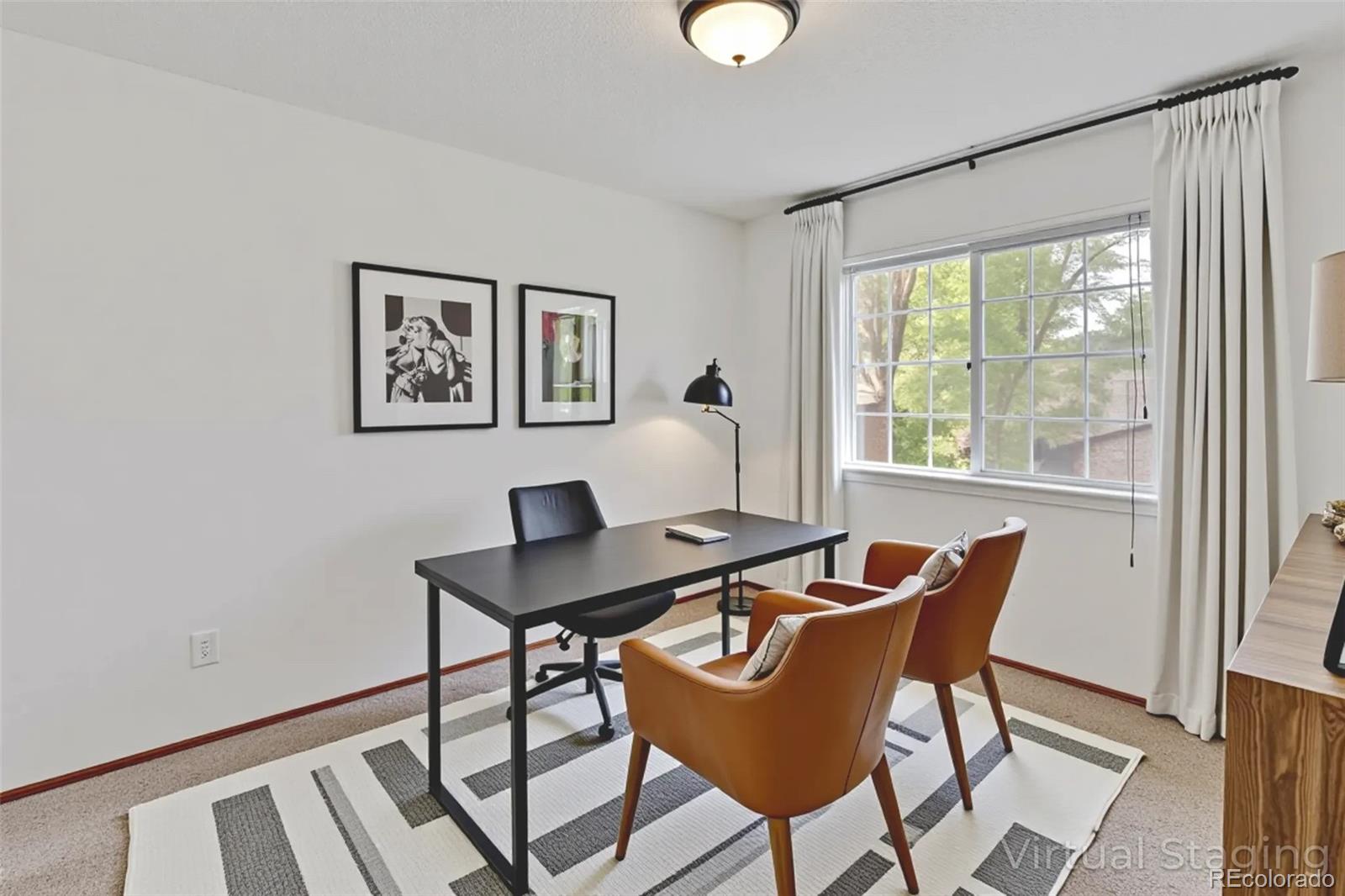 8441 Timberwood Street Highlands Ranch, CO 80126 - Photo 25 of 32 a view of a workspace with furniture and a window