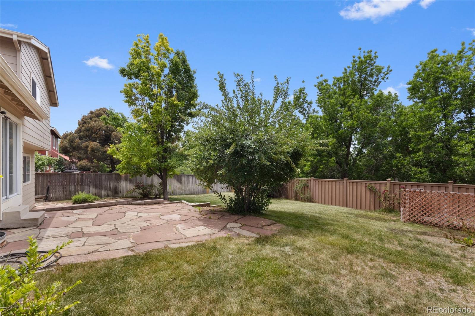 8441 Timberwood Street Highlands Ranch, CO 80126 - Photo 26 of 32 a view of a backyard