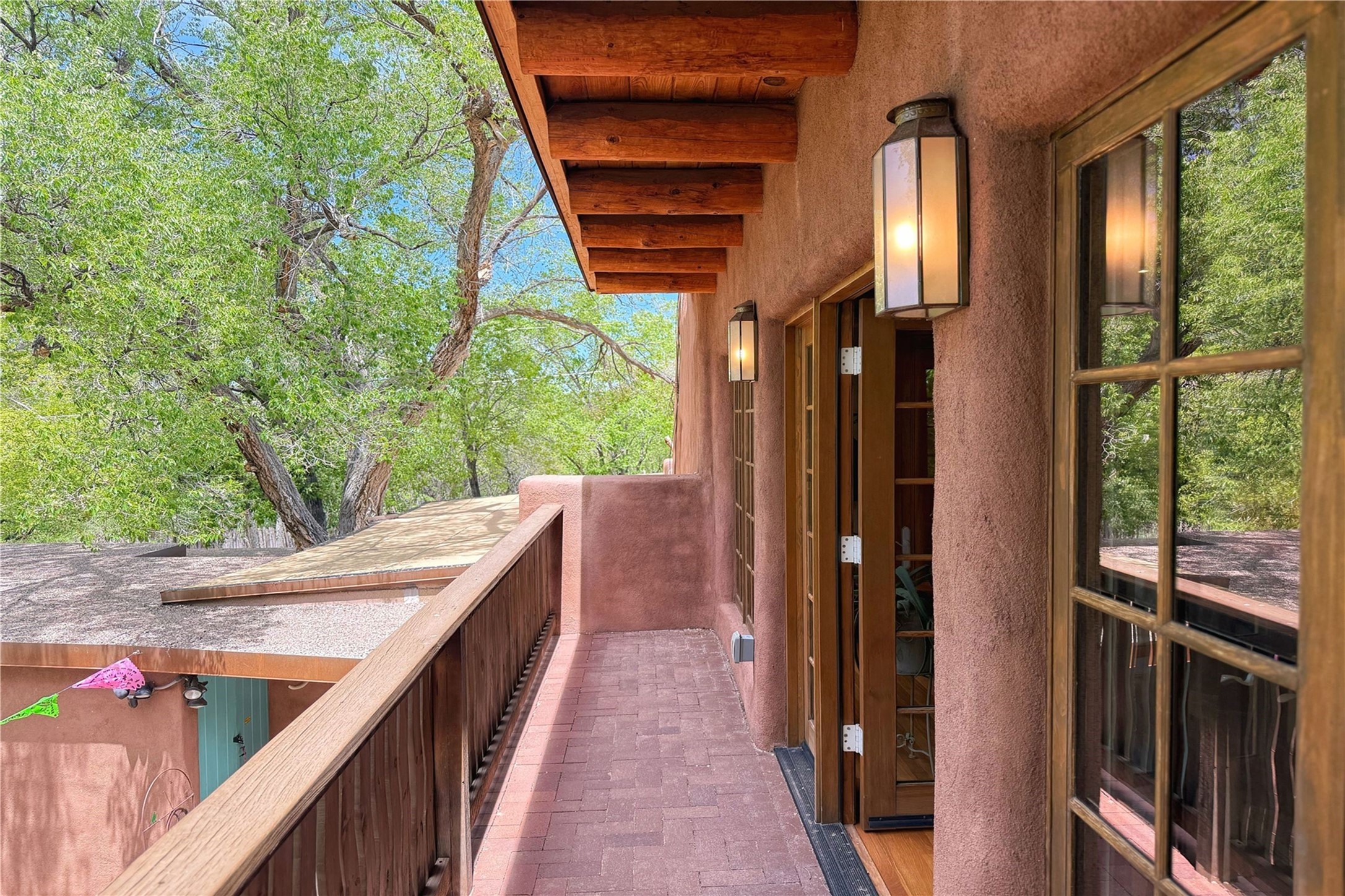 1352 Bishops Lodge Road Santa Fe, NM 87506 - Photo 27 of 66 balcony off of main house living room