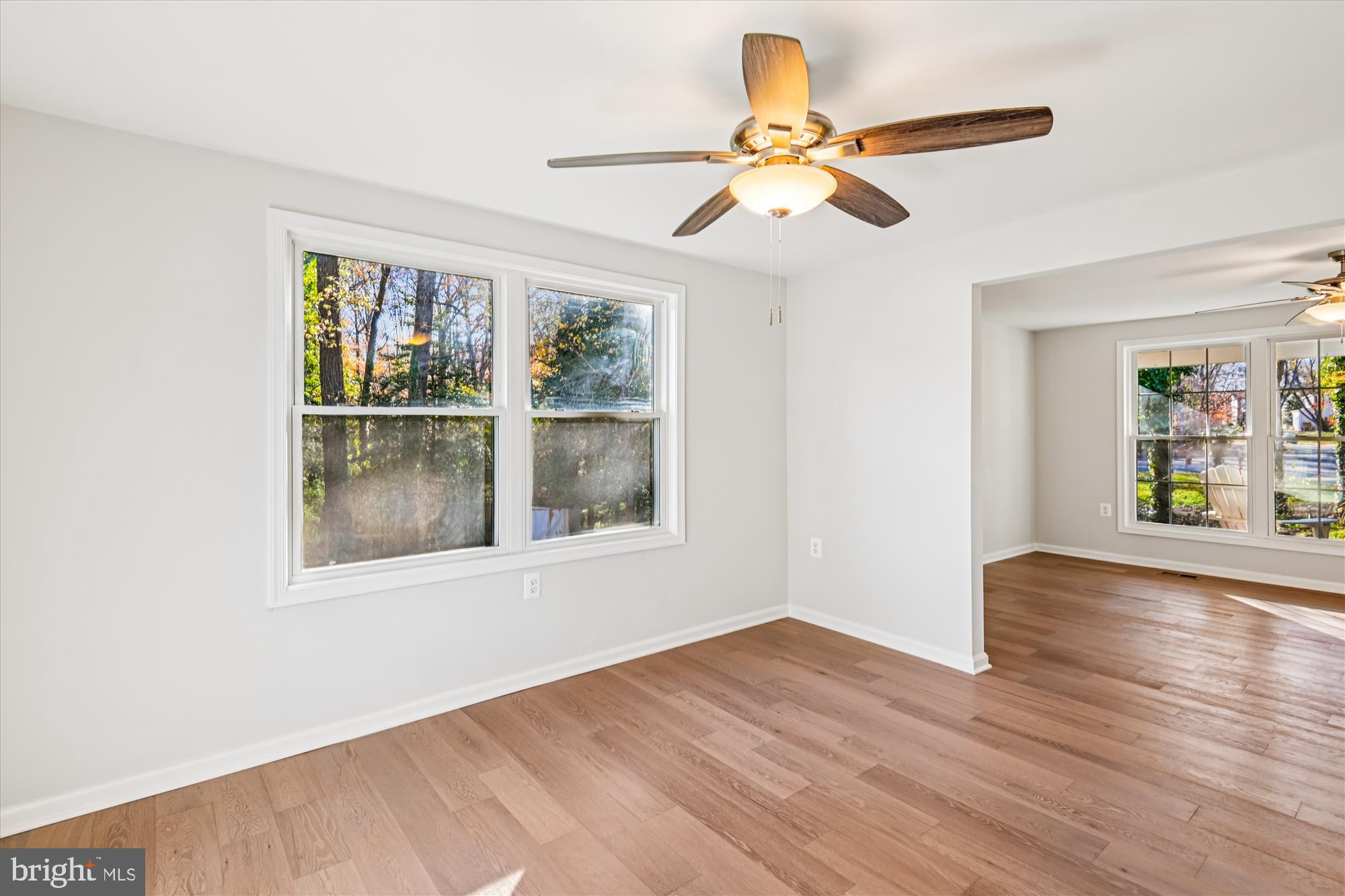3092 Sussex Place Riva, MD 21140 - Photo 30 of 105 a view of an empty room with wooden floor and a window