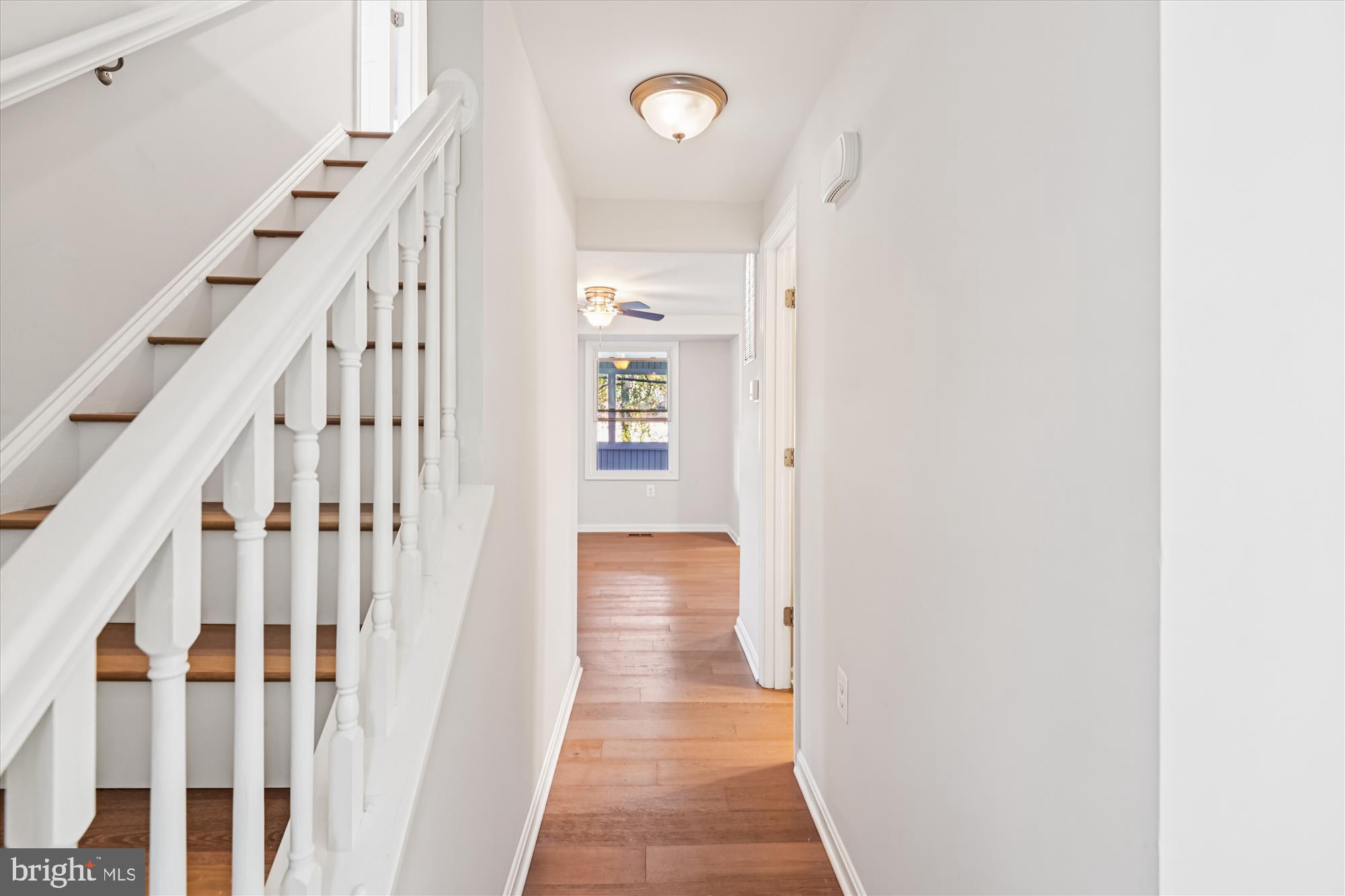 3092 Sussex Place Riva, MD 21140 - Photo 38 of 105 a view of a hallway with wooden floor and entryway