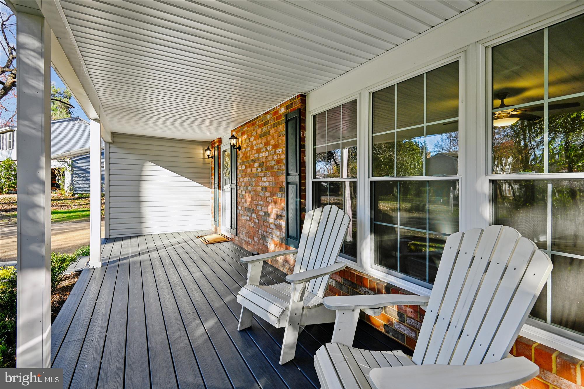 3092 Sussex Place Riva, MD 21140 - Photo 4 of 105 a view of a deck with couches chairs with wooden floor and fence