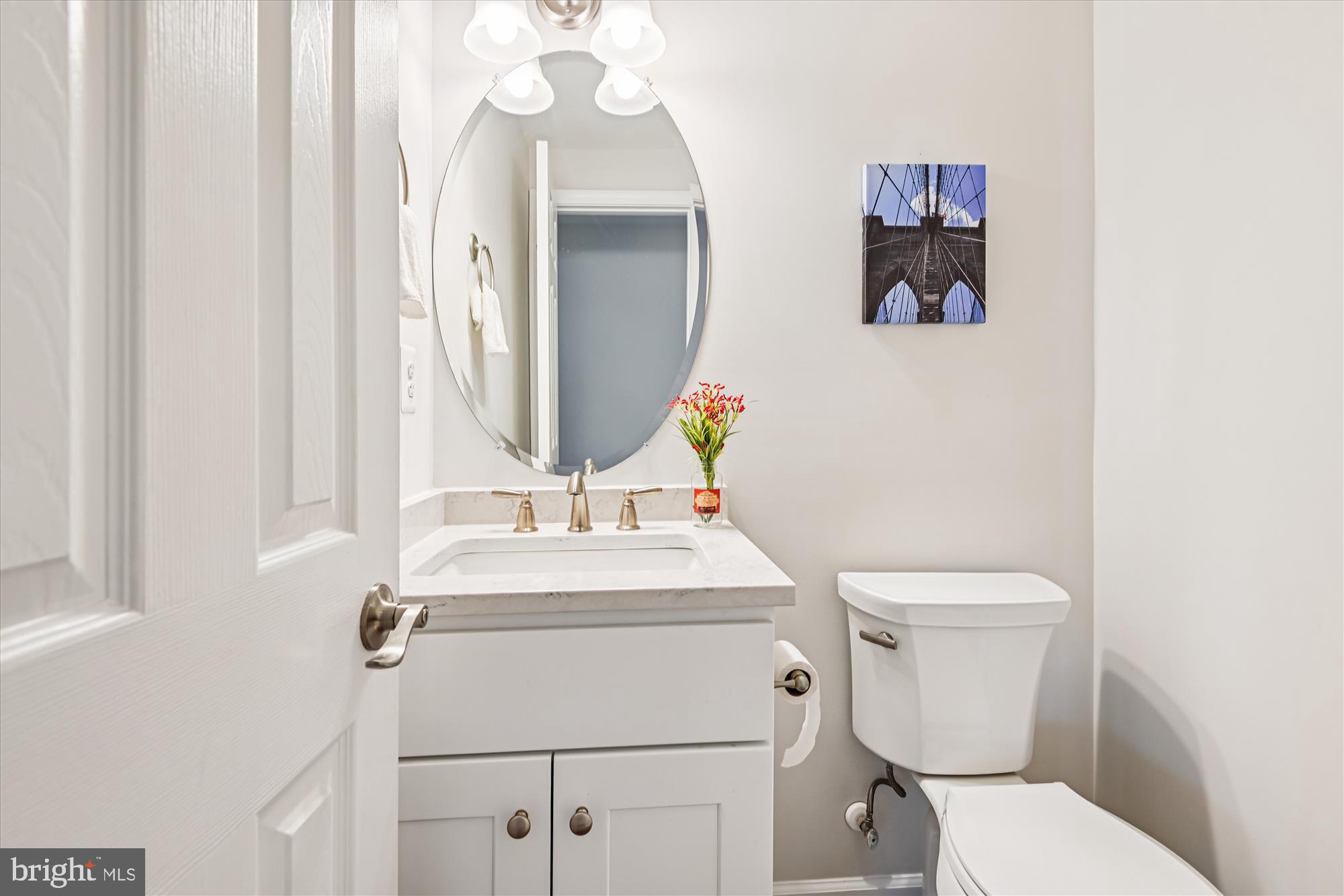 3092 Sussex Place Riva, MD 21140 - Photo 45 of 105 a bathroom with a toilet sink and mirror