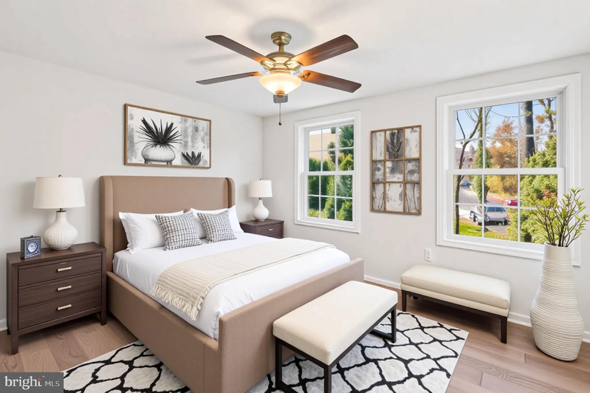 3092 Sussex Place Riva, MD 21140 - Photo 63 of 105 a bedroom with a bed a couch and a window