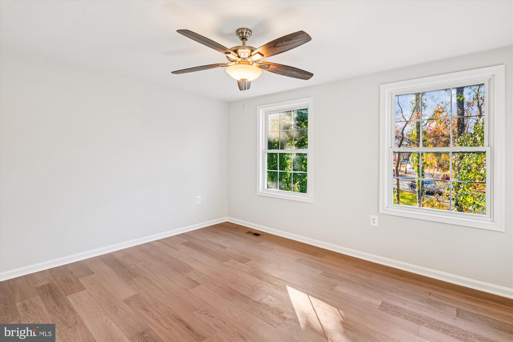3092 Sussex Place Riva, MD 21140 - Photo 64 of 105 an empty room with window and ceiling fan