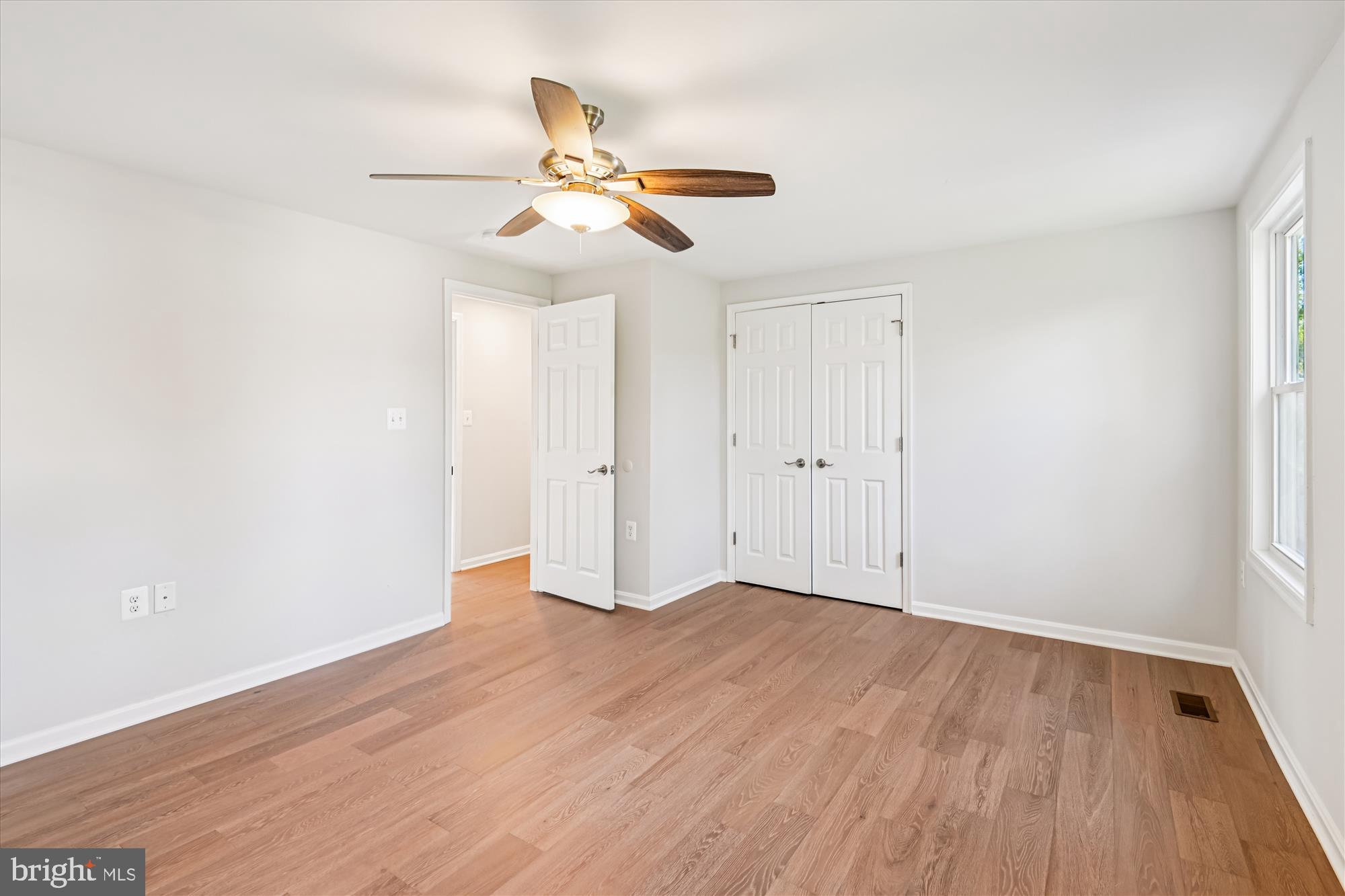 3092 Sussex Place Riva, MD 21140 - Photo 68 of 105 a view of an empty room with wooden floor