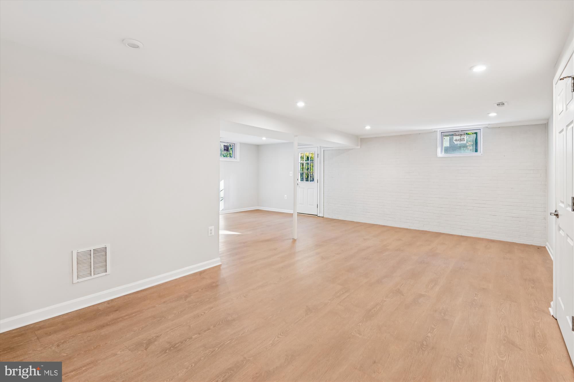 3092 Sussex Place Riva, MD 21140 - Photo 80 of 105 an empty room with wooden floor and windows