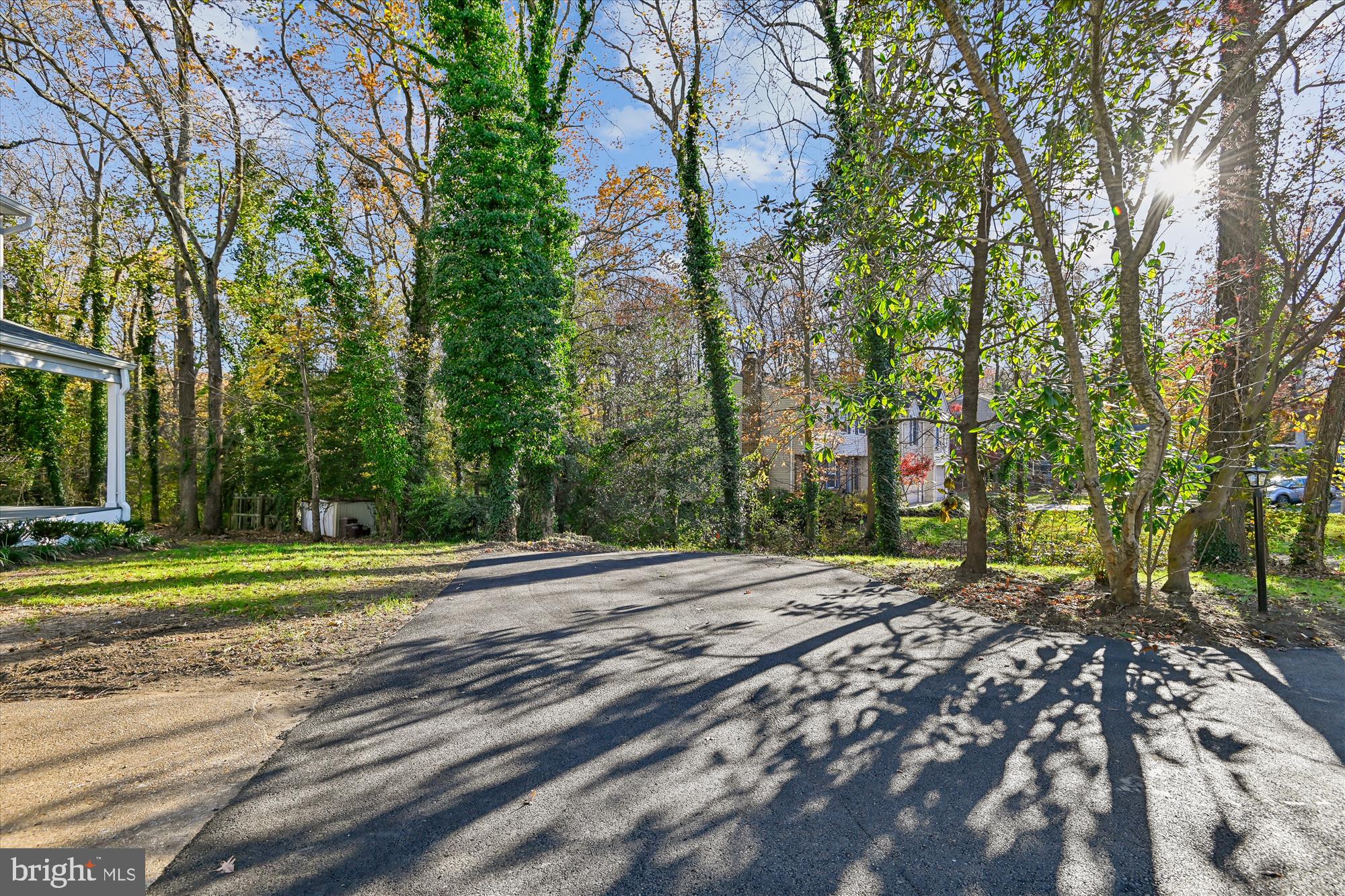 3092 Sussex Place Riva, MD 21140 - Photo 8 of 105 a view of a road with a yard and a building