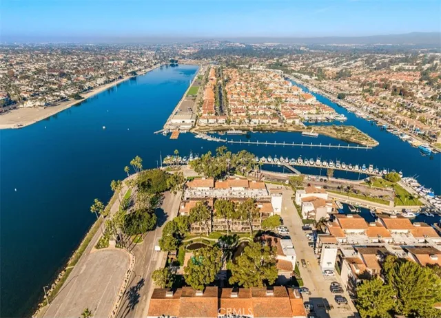 a bathroom with a sink toilet a mirror and shower