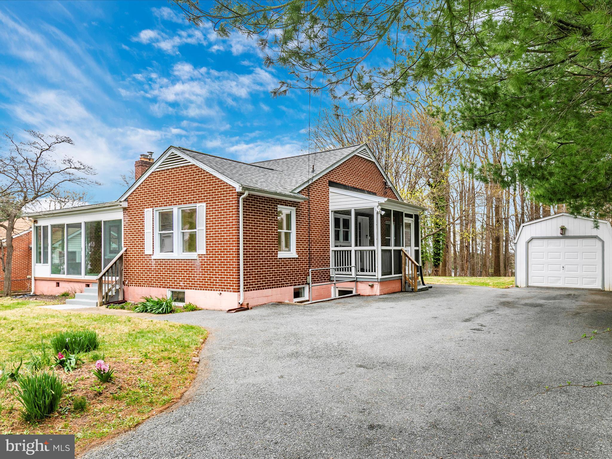 8913 Yellow Springs Road Frederick, MD 21702 - Photo 1 of 77 a front view of a house with a yard