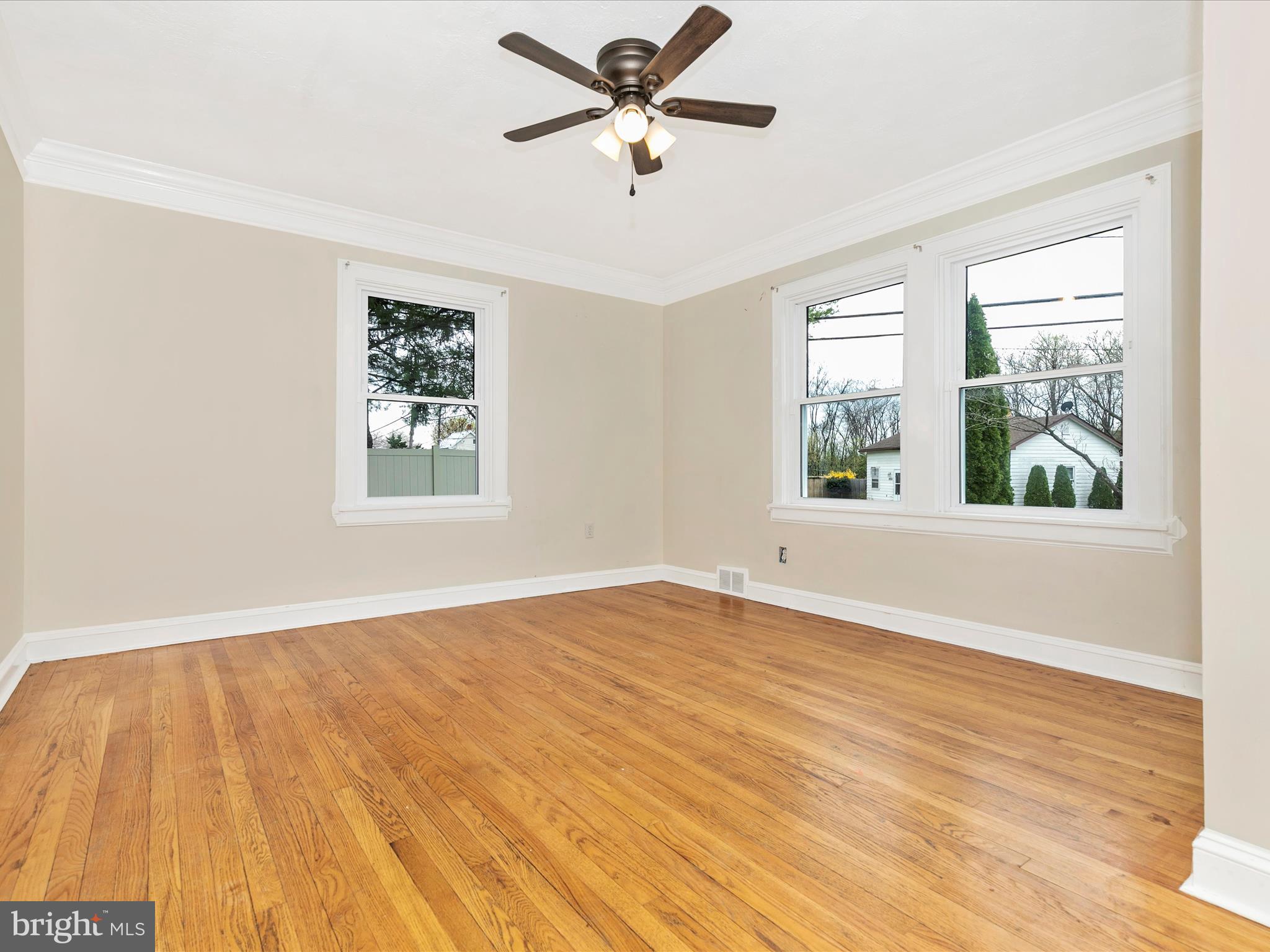 8913 Yellow Springs Road Frederick, MD 21702 - Photo 20 of 77 a view of an empty room with a window and wooden floor