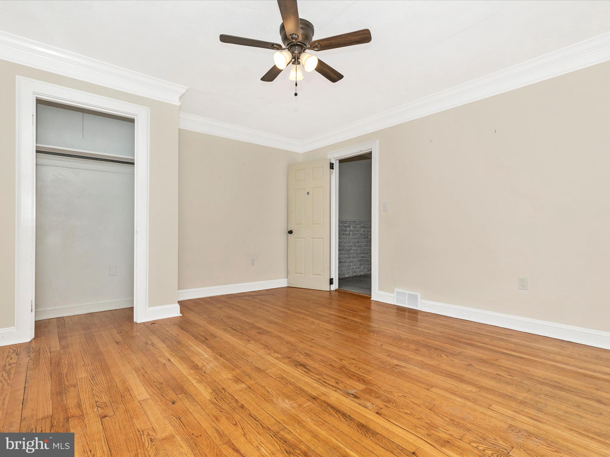 8913 Yellow Springs Road Frederick, MD 21702 - Photo 22 of 77 wooden floor in an empty room
