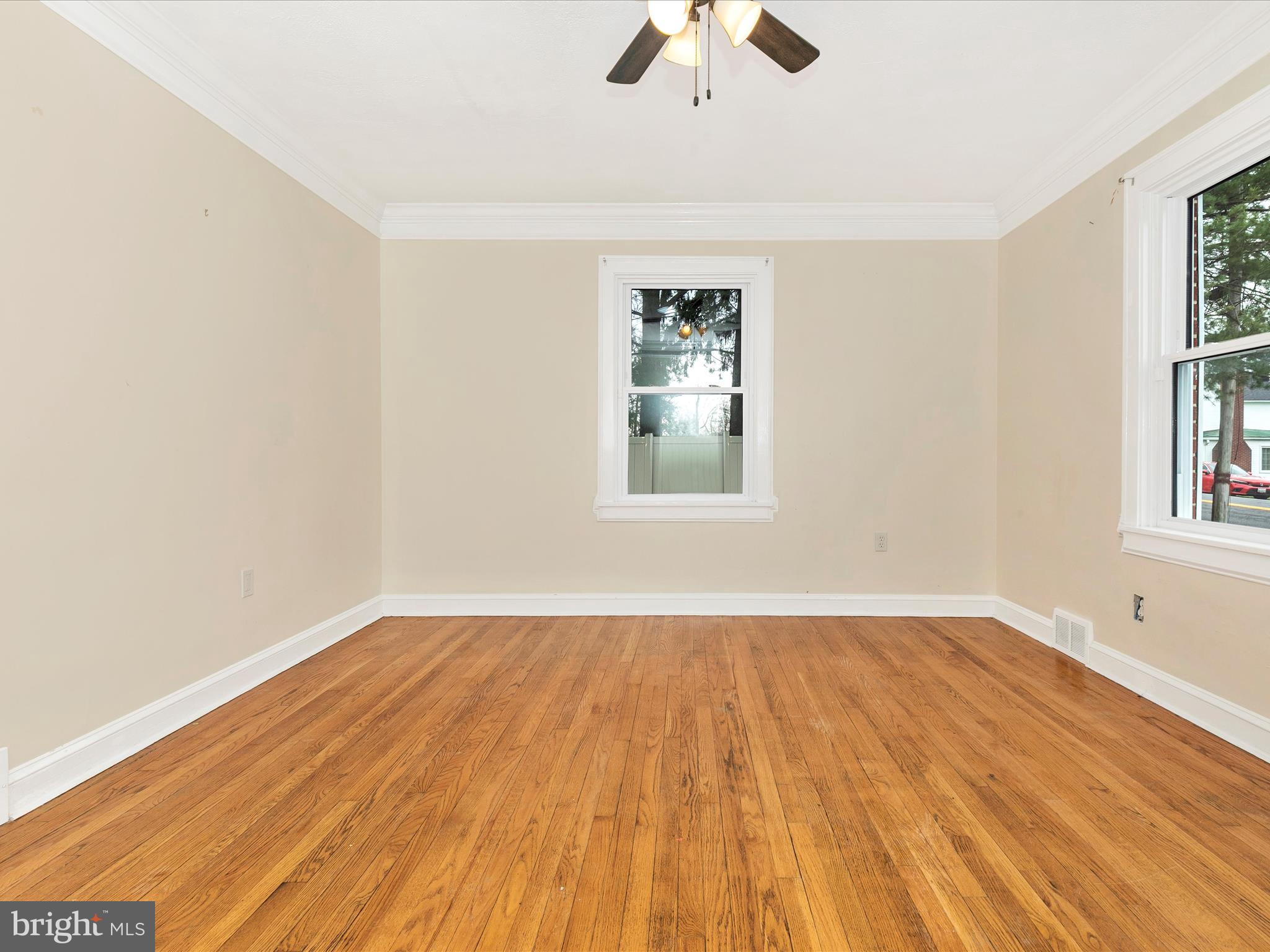 8913 Yellow Springs Road Frederick, MD 21702 - Photo 23 of 77 wooden floor in an empty room with a window
