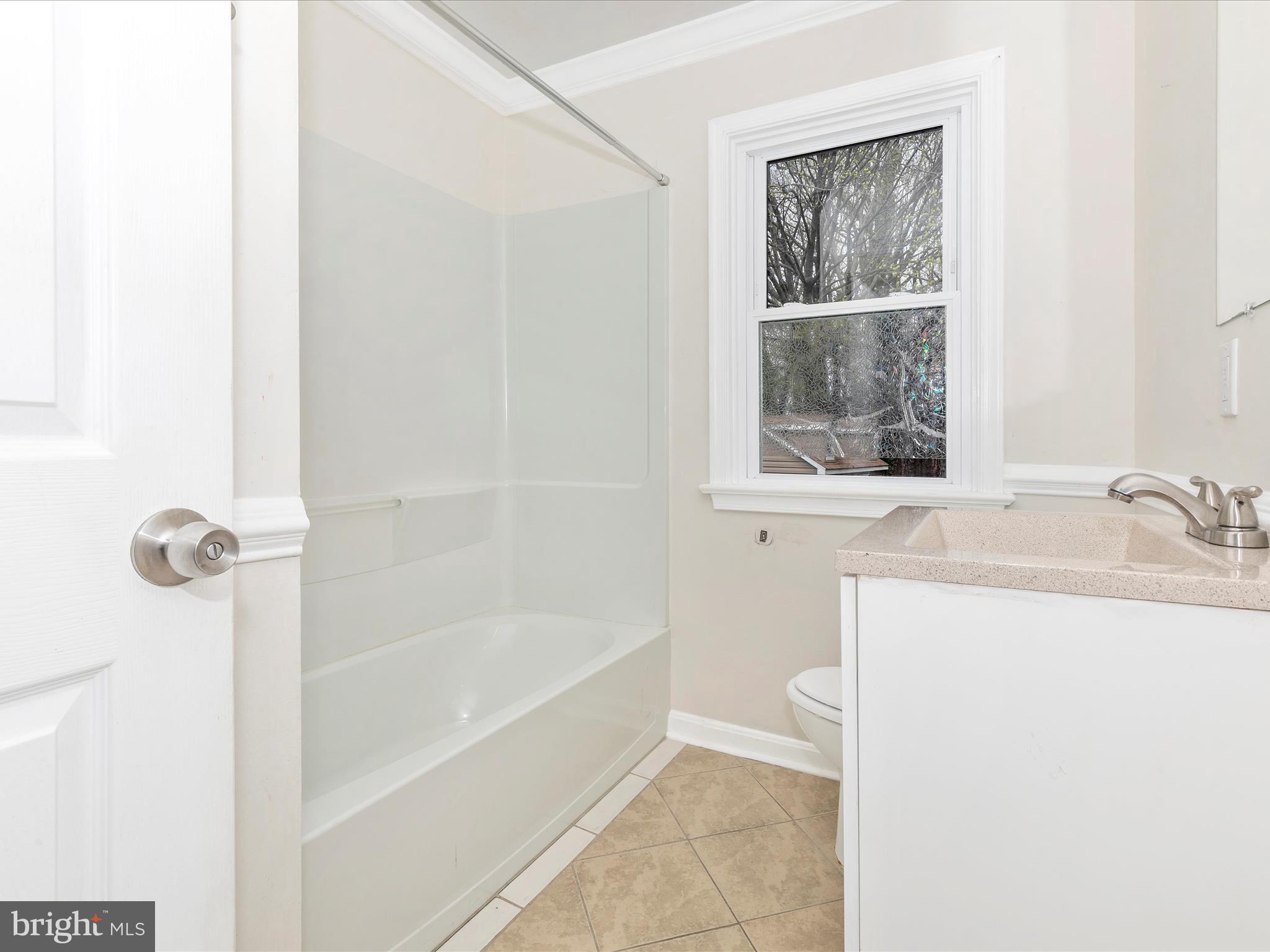 8913 Yellow Springs Road Frederick, MD 21702 - Photo 33 of 77 a white bath tub sitting next to a white sink