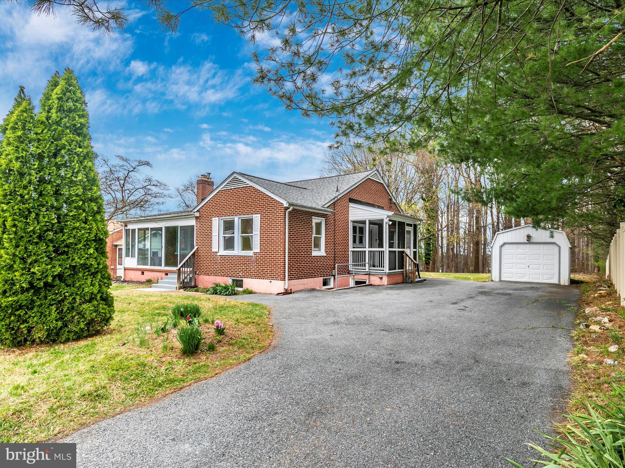 8913 Yellow Springs Road Frederick, MD 21702 - Photo 57 of 77 a front view of a house with a garden