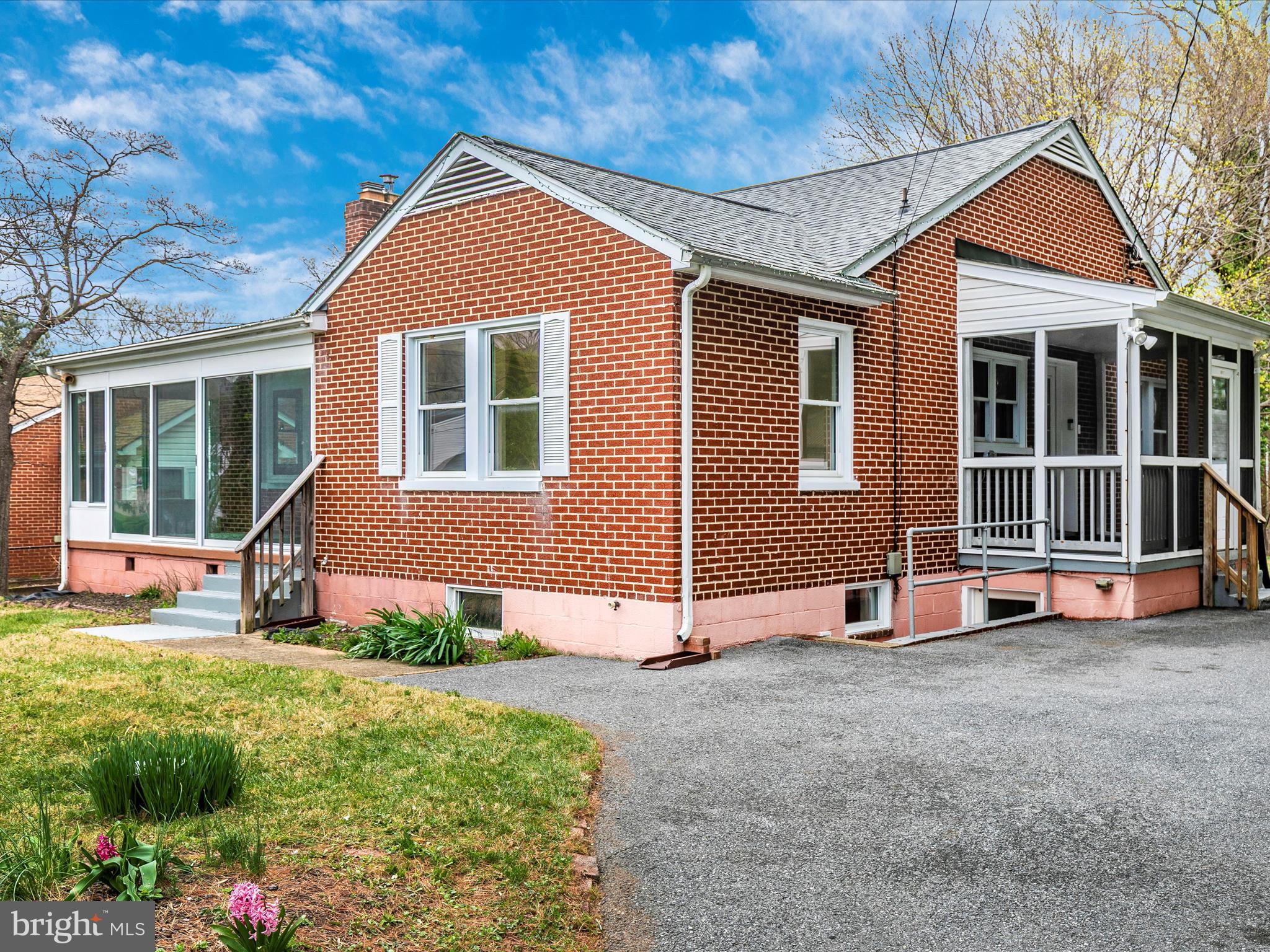 8913 Yellow Springs Road Frederick, MD 21702 - Photo 58 of 77 a front view of a house with a yard and garage