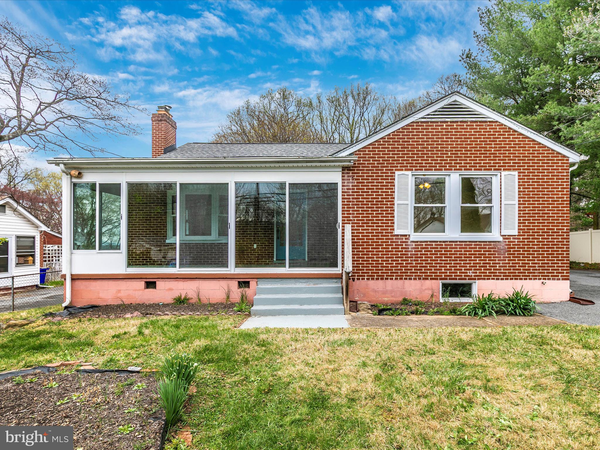 8913 Yellow Springs Road Frederick, MD 21702 - Photo 59 of 77 a front view of a house with a yard