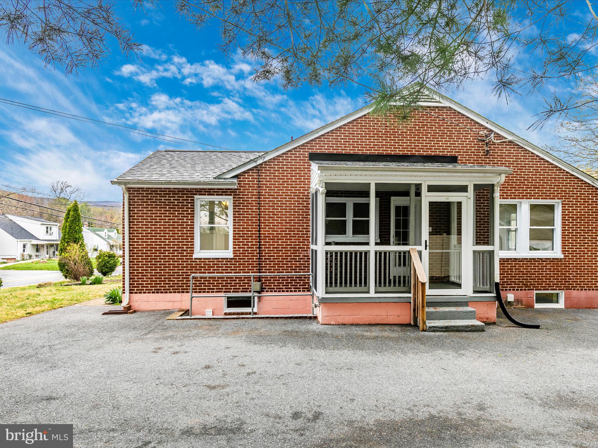 8913 Yellow Springs Road Frederick, MD 21702 - Photo 62 of 77 a front view of a house with a yard