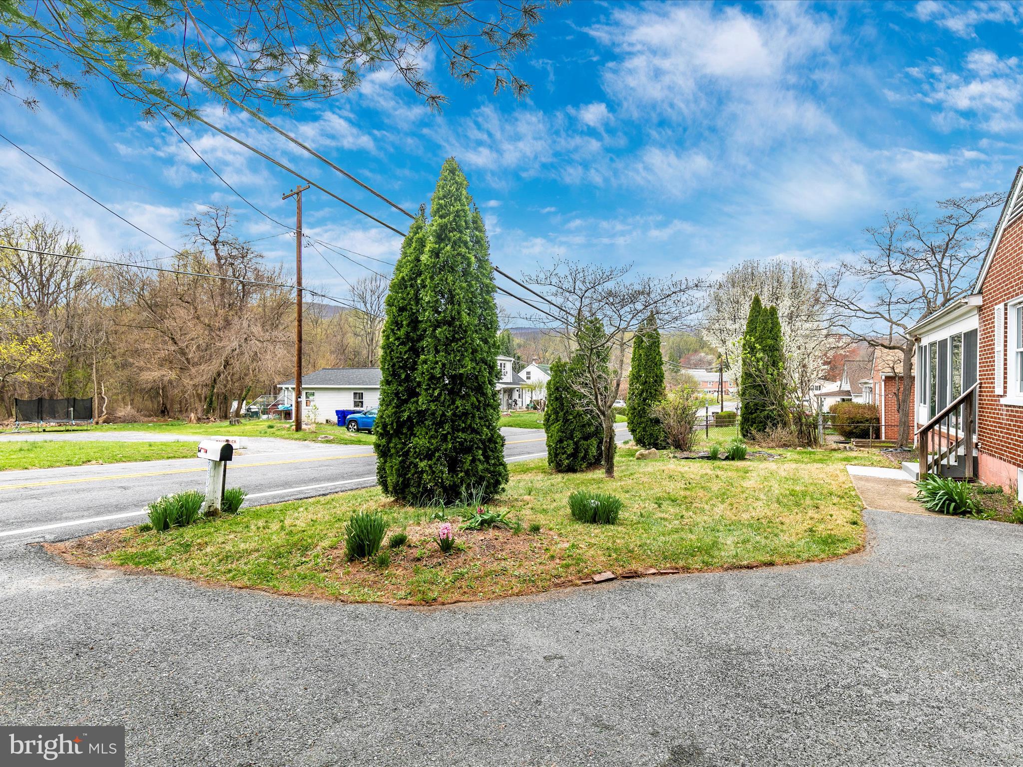 8913 Yellow Springs Road Frederick, MD 21702 - Photo 63 of 77 a view of a yard in front of a house
