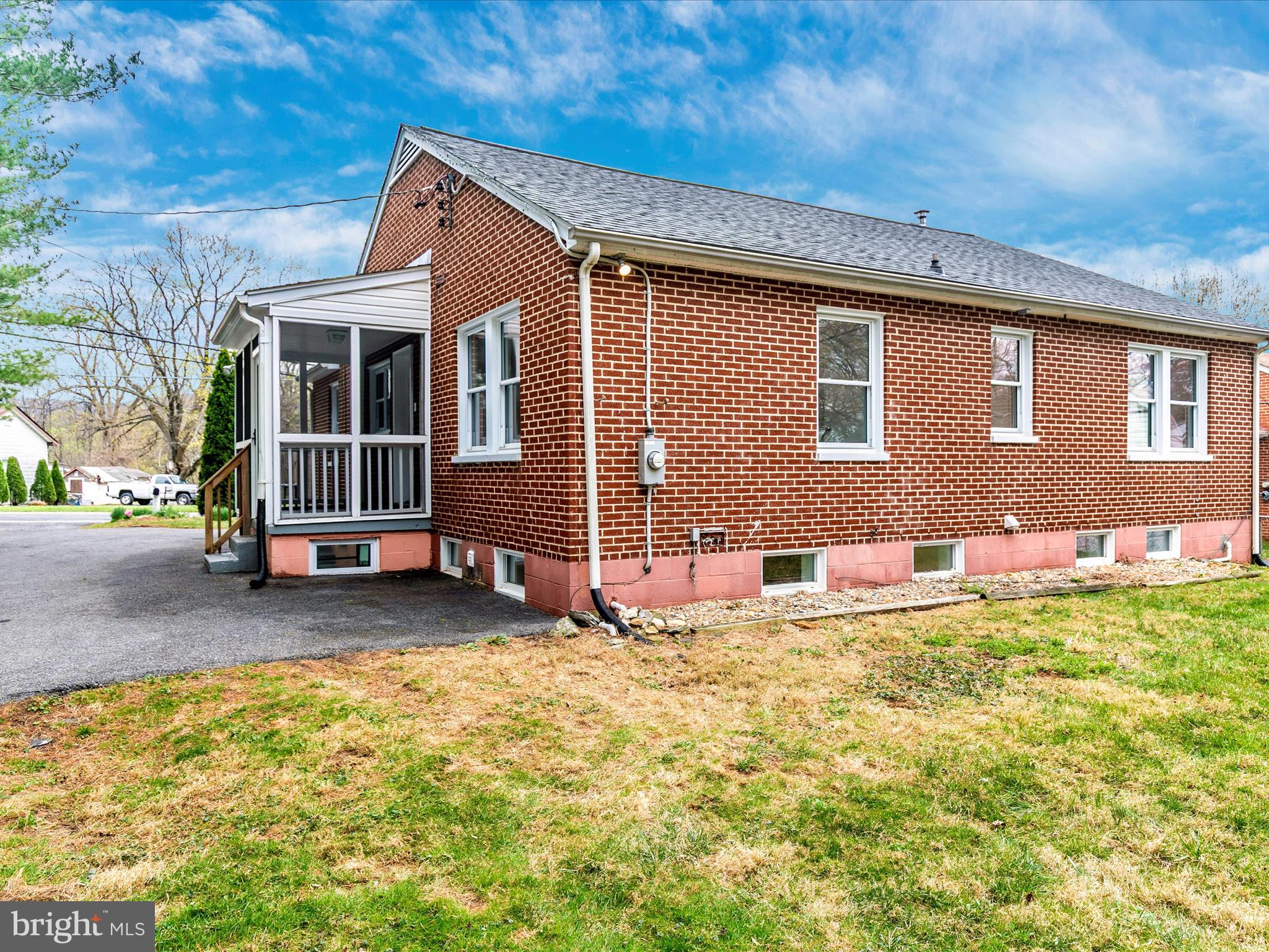 8913 Yellow Springs Road Frederick, MD 21702 - Photo 68 of 77 a front view of a house with a garden and yard